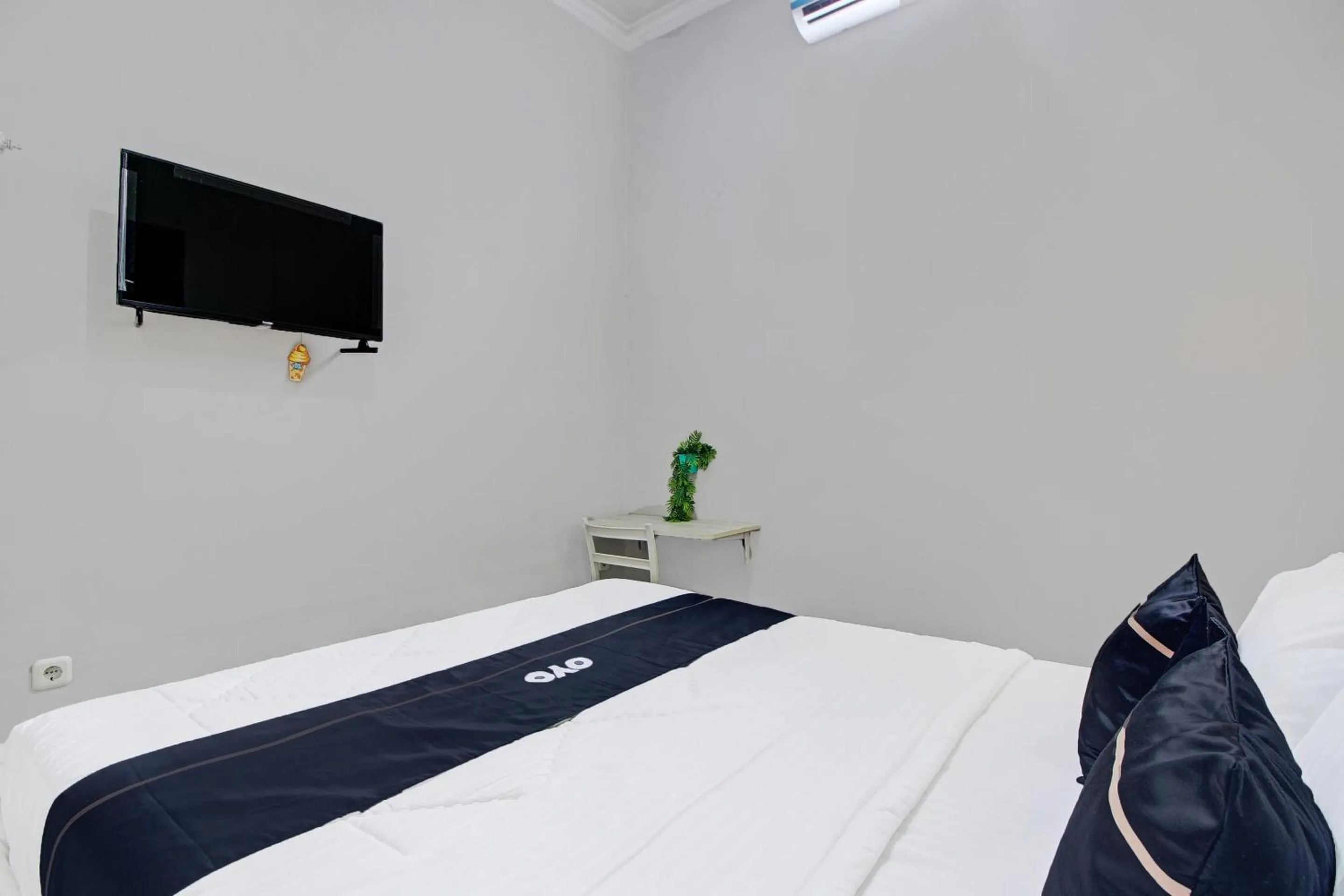 Bedroom in Capital O 92250 Hall & Guesthouse Kowapi Syariah