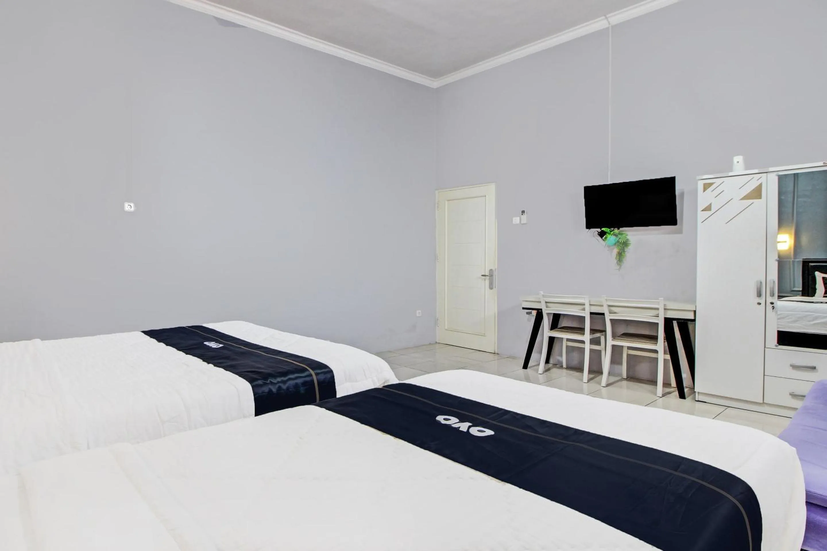 Bedroom in Capital O 92250 Hall & Guesthouse Kowapi Syariah