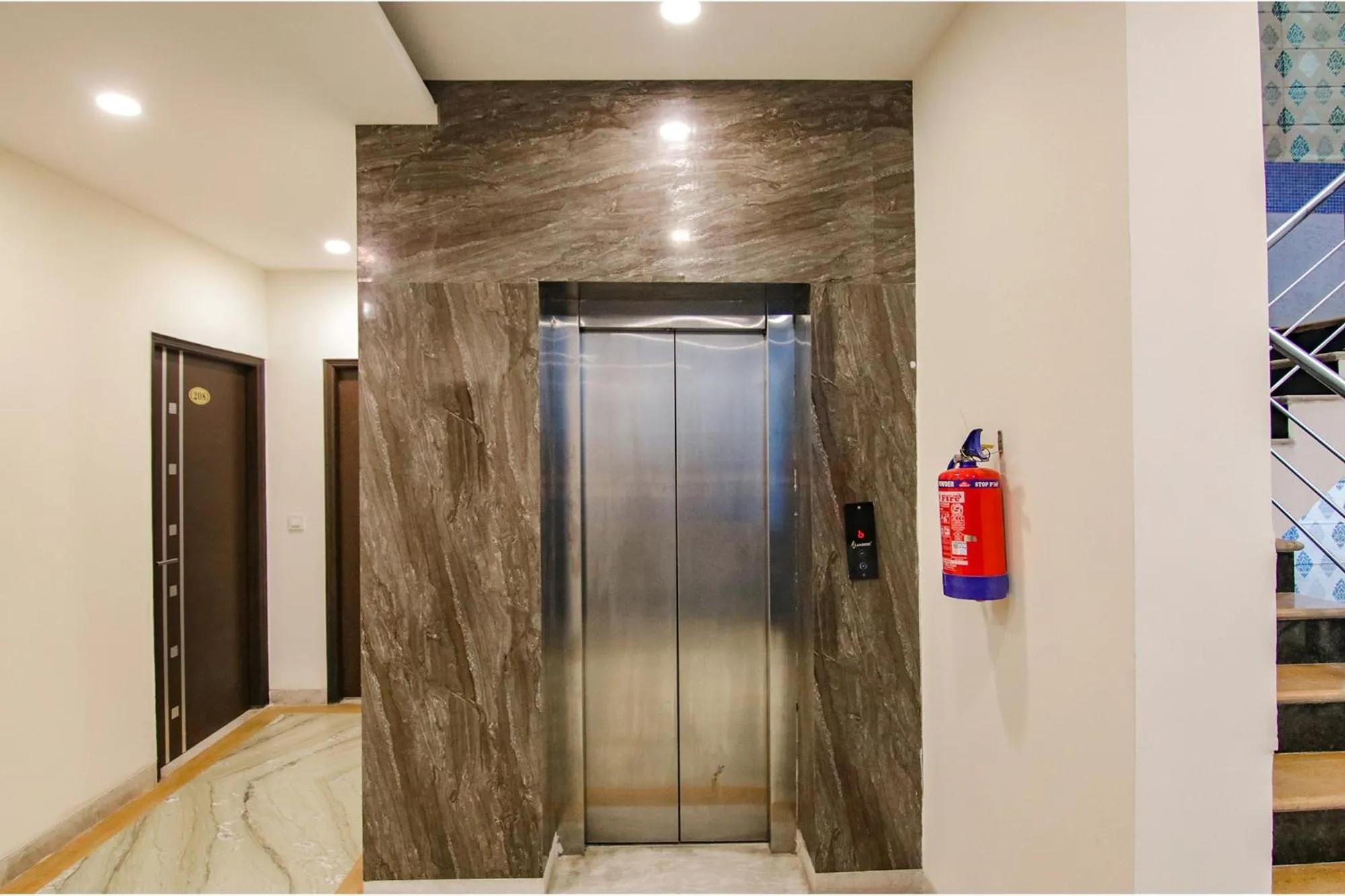 elevator in Hotel Leaf 9 INN, Cyber City near Ambience Mall