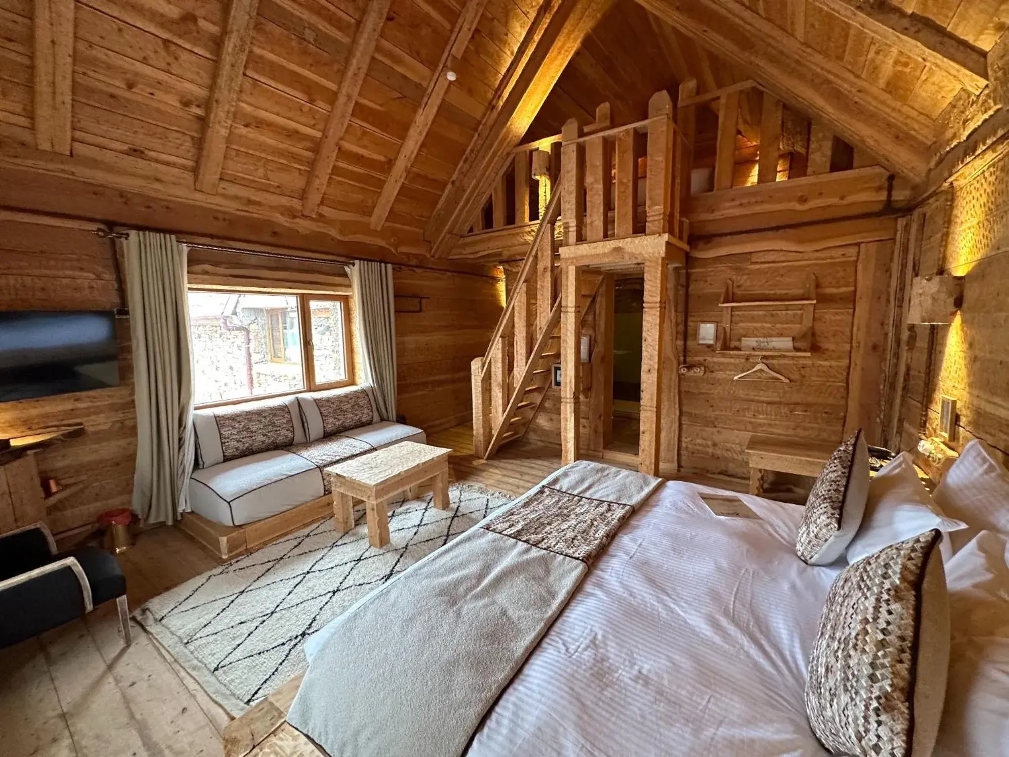 Duplex Quadruple Room in Hotel Xaluca Spa Aguelmame Sidi Ali Duplex Quadruple Room in Hotel Xaluca Spa Aguelmame Sidi Ali