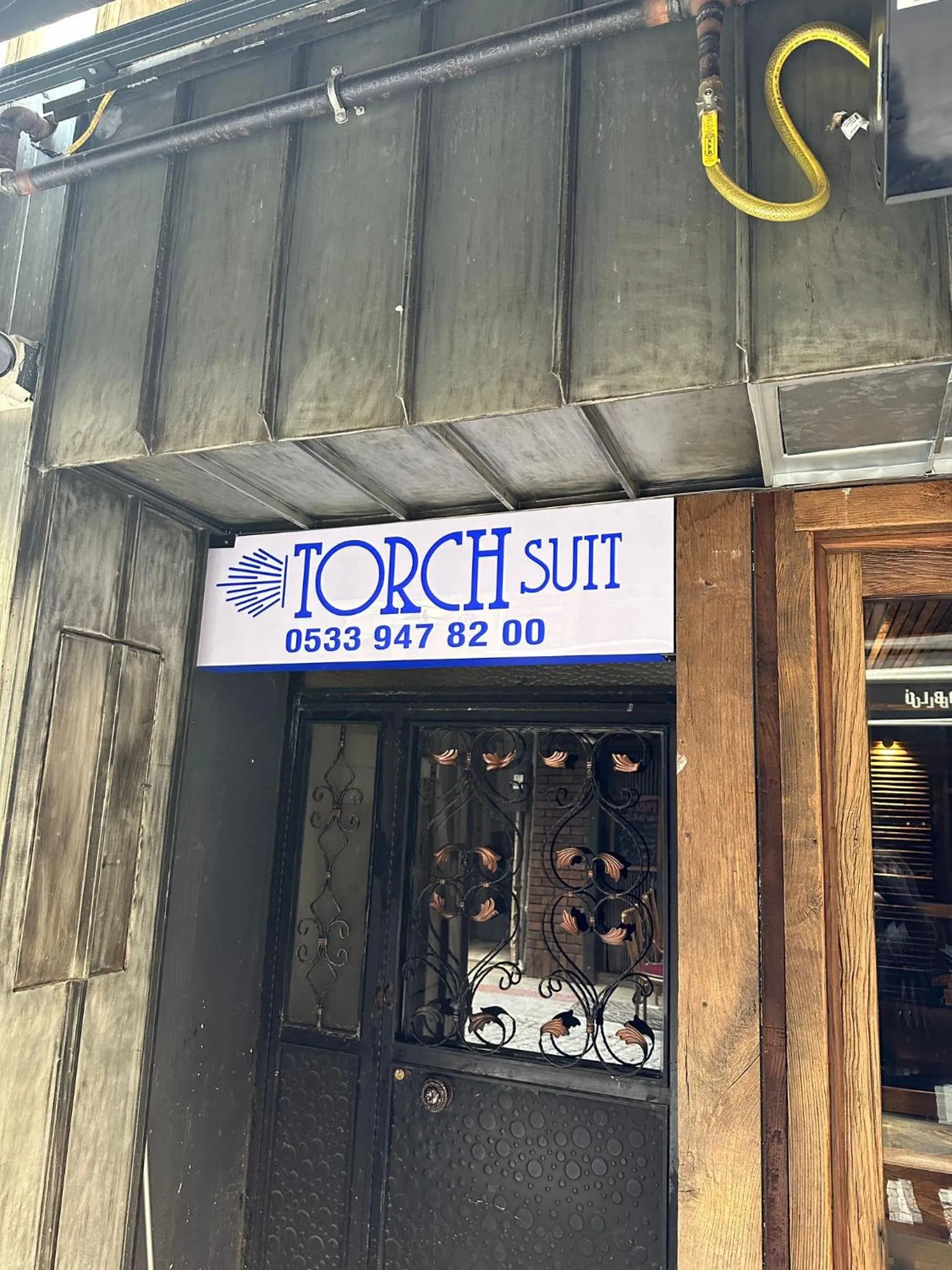 Property logo or sign in Torch Suit