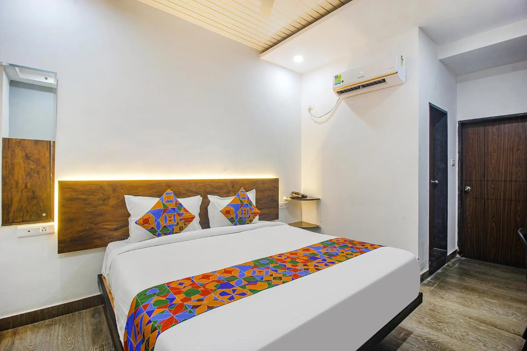 Living room, Bed in FabHotel W Grand Suites