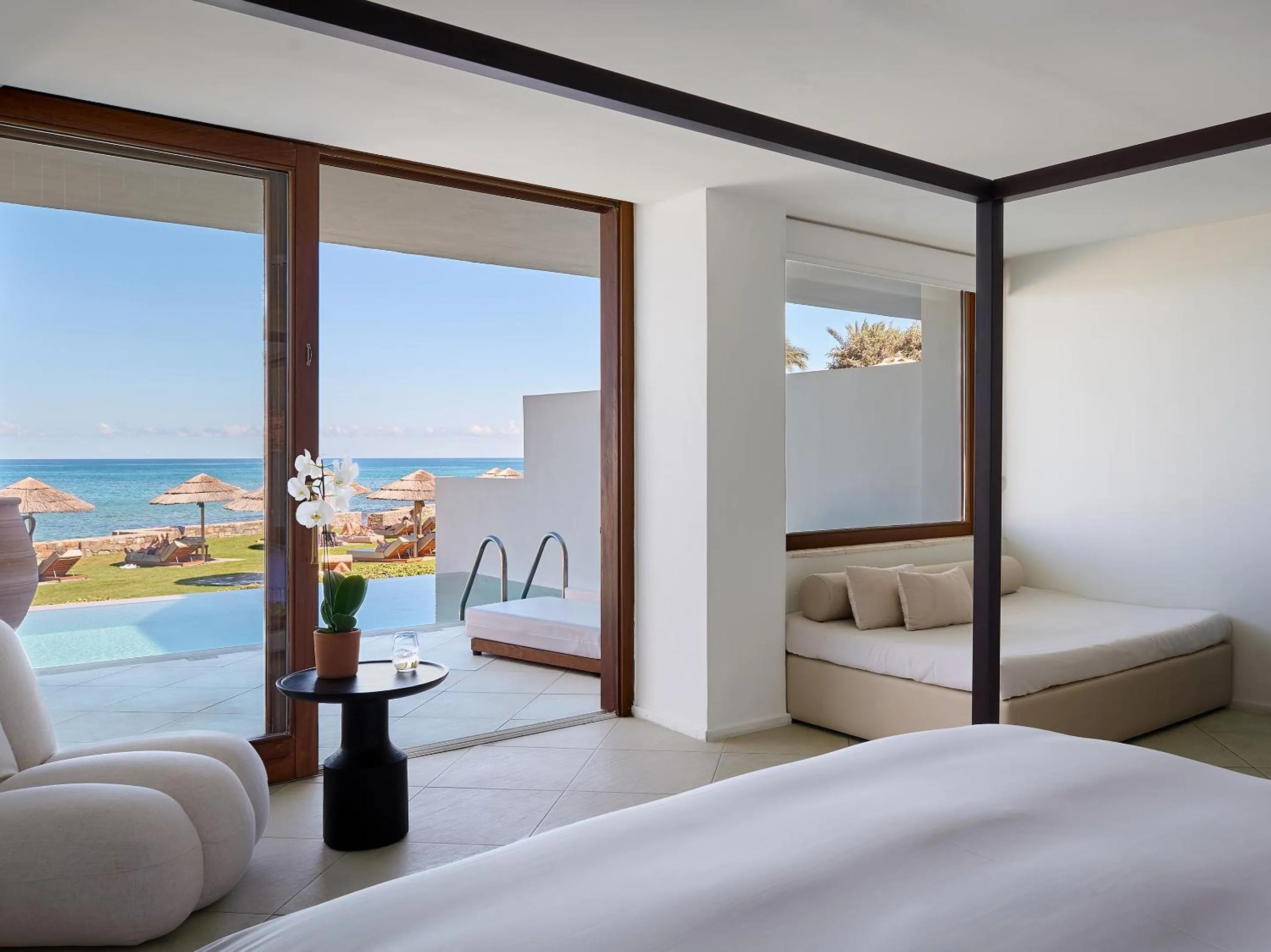 Swimming pool, Bed in Amirandes, A Grecotel Resort to Live