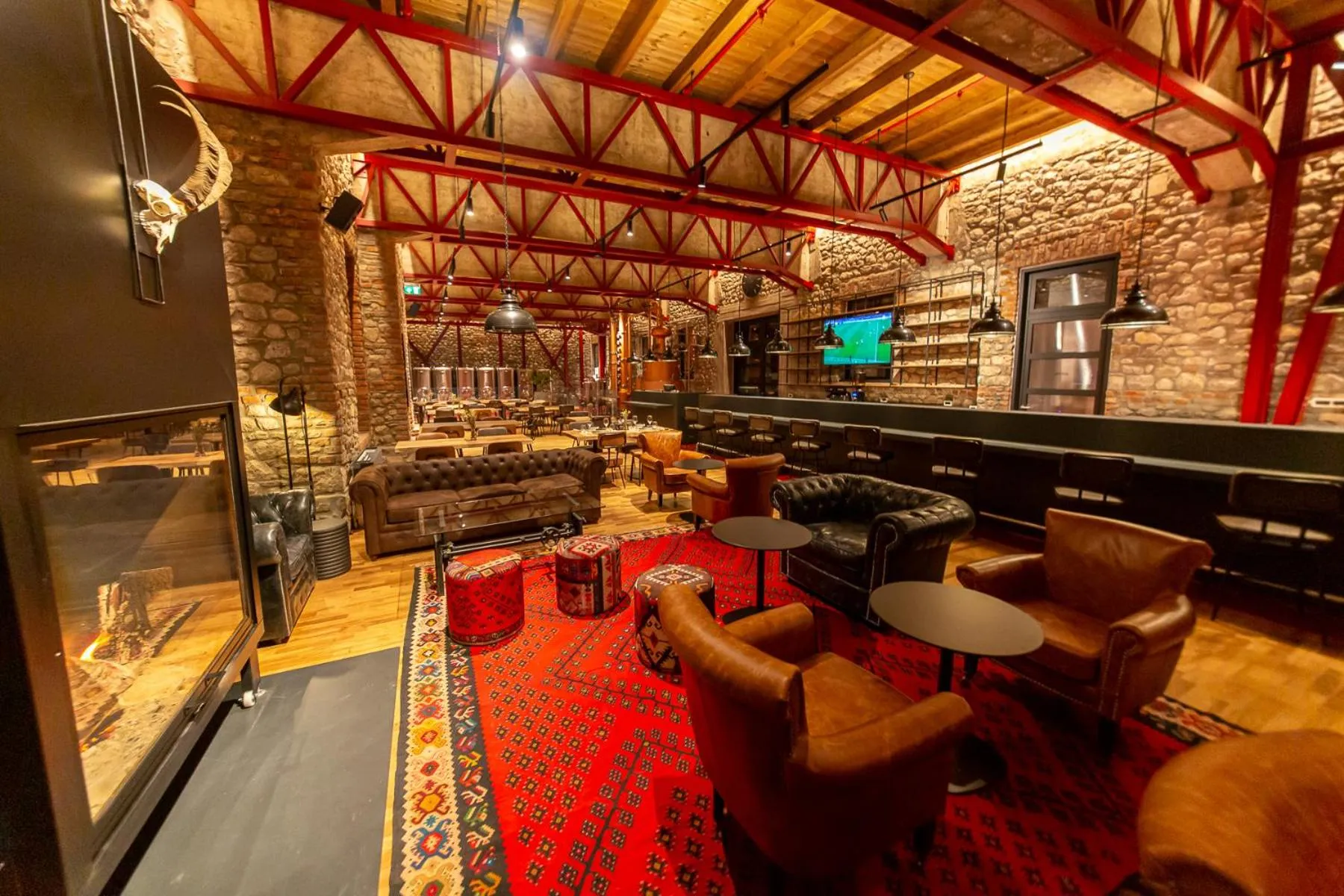 Communal lounge/ TV room in Melesin Distillery