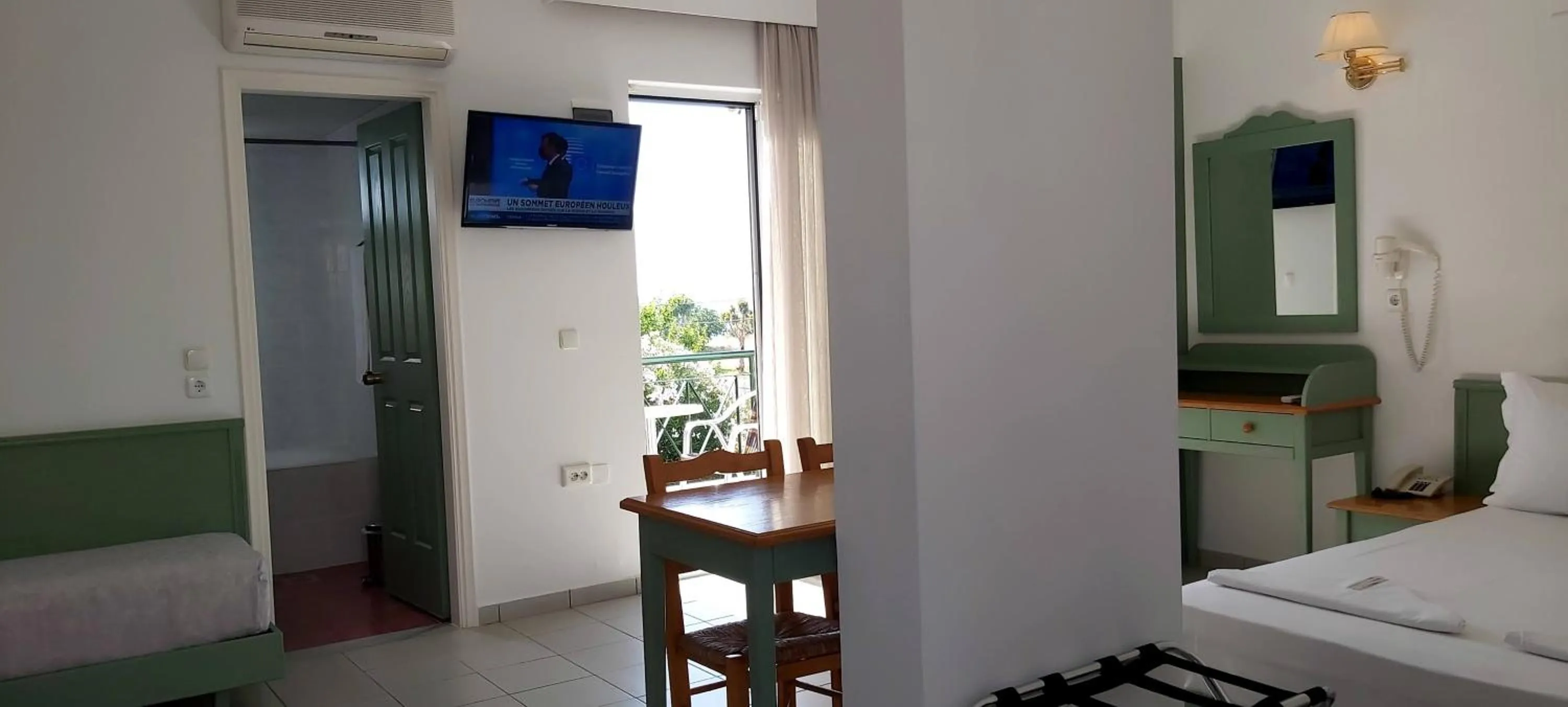 TV and multimedia, Bed in Andromeda Hotel Apartments