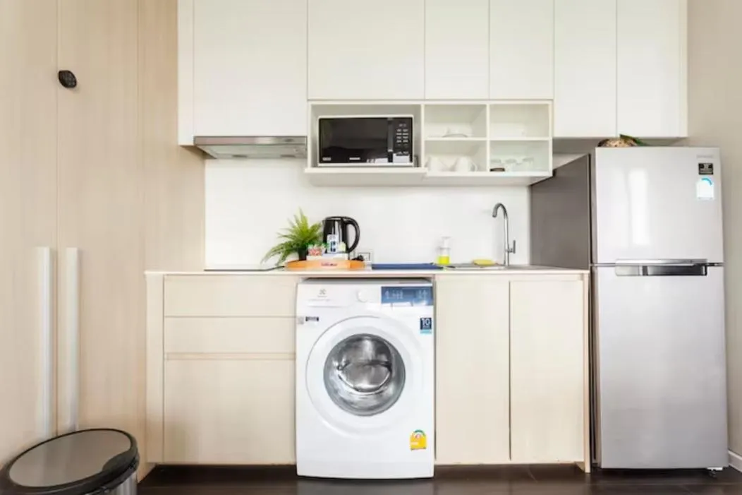 Kitchen or kitchenette in Family Suite Sea view 2Bedroom at Veranda Residence Pattaya