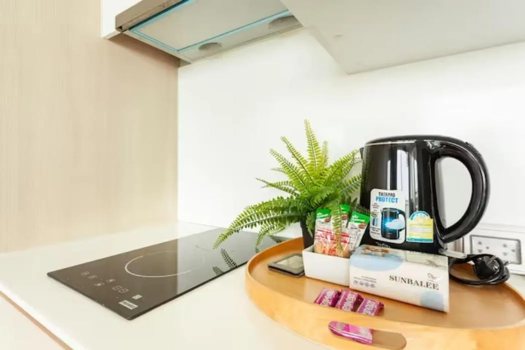 Kitchen or kitchenette in Family Suite Sea view 2Bedroom at Veranda Residence Pattaya