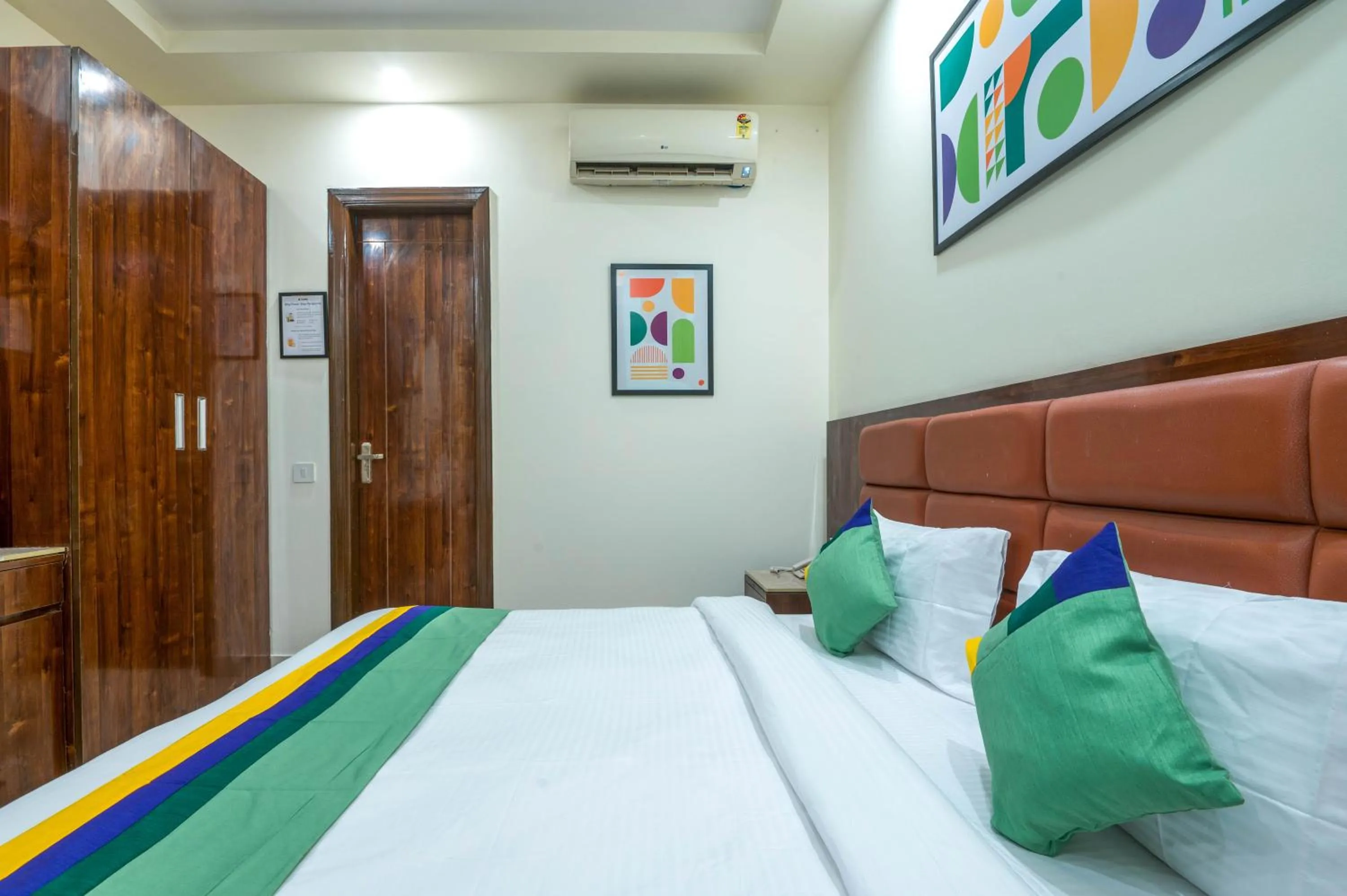 Bedroom, Bed in Treebo Sunny Feast