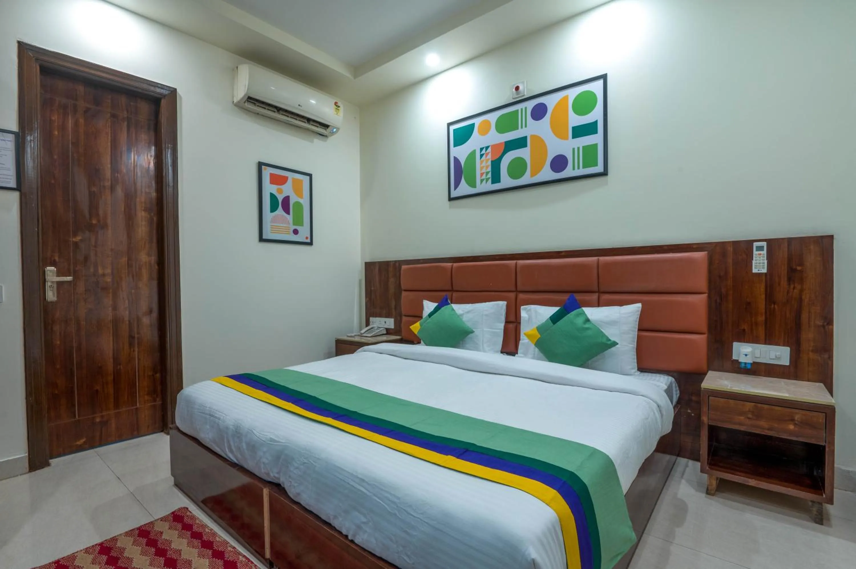 Bedroom, Bed in Treebo Sunny Feast