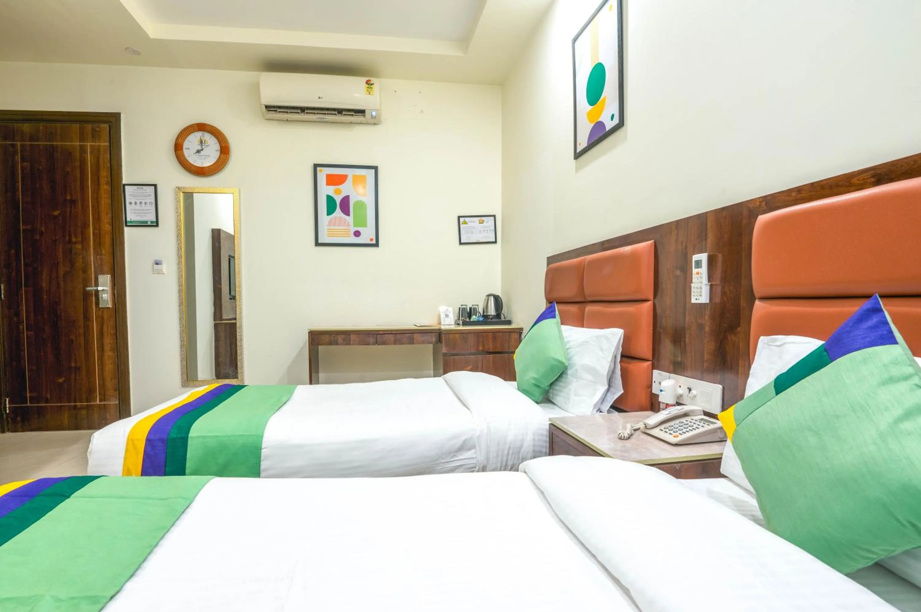 Bedroom, Bed in Treebo Sunny Feast