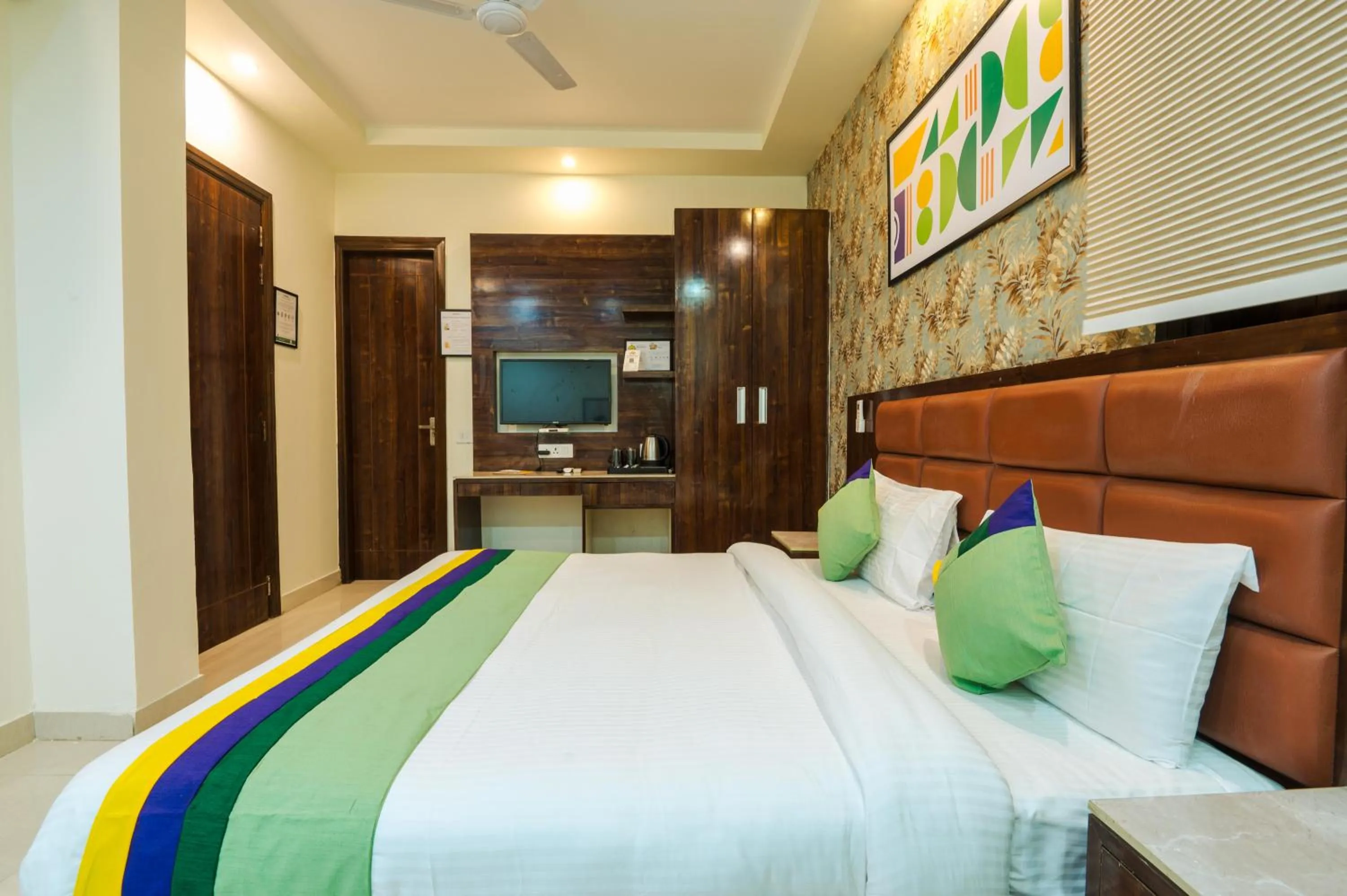 Bedroom, Bed in Treebo Sunny Feast