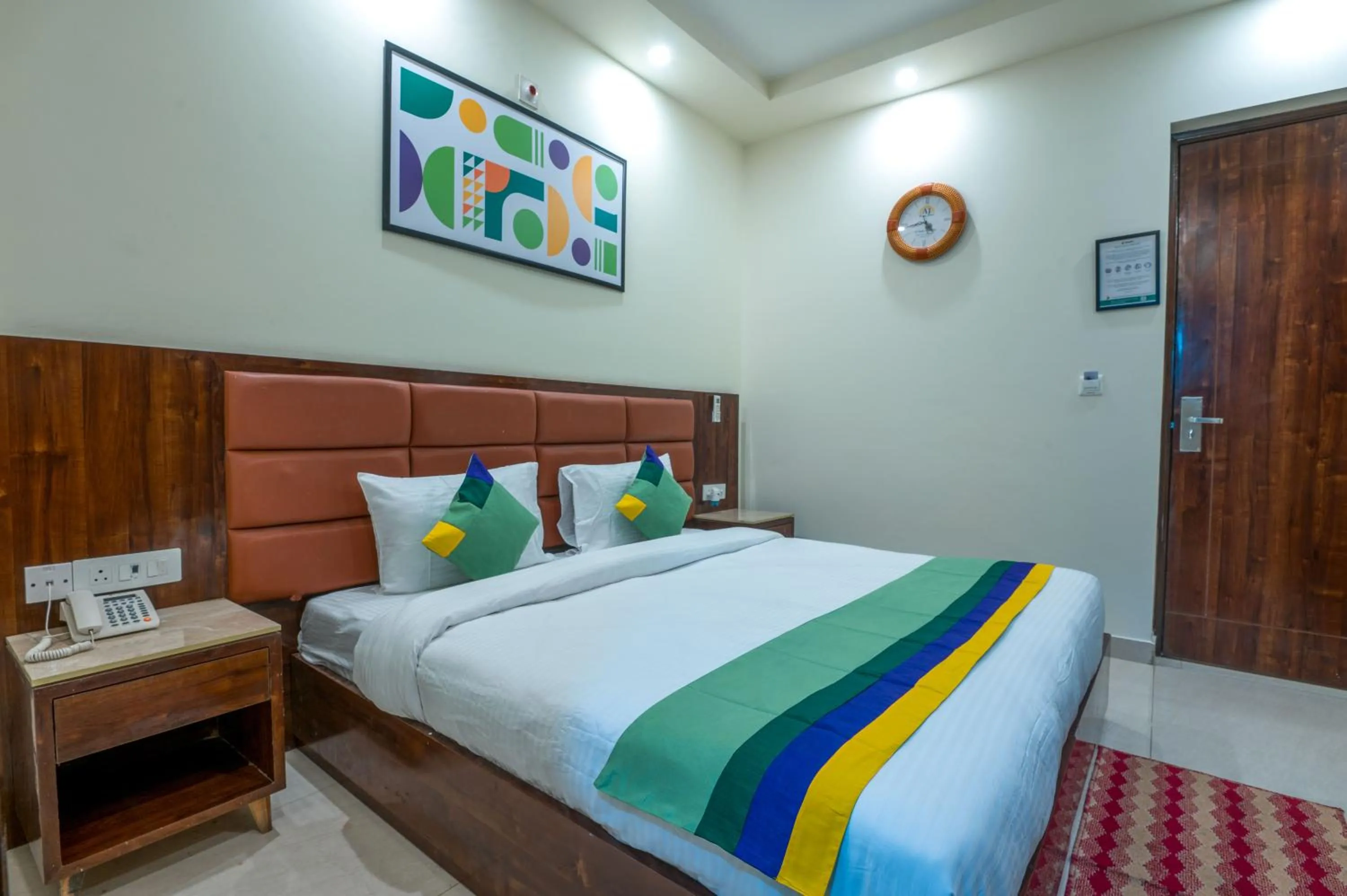 Bedroom, Bed in Treebo Sunny Feast