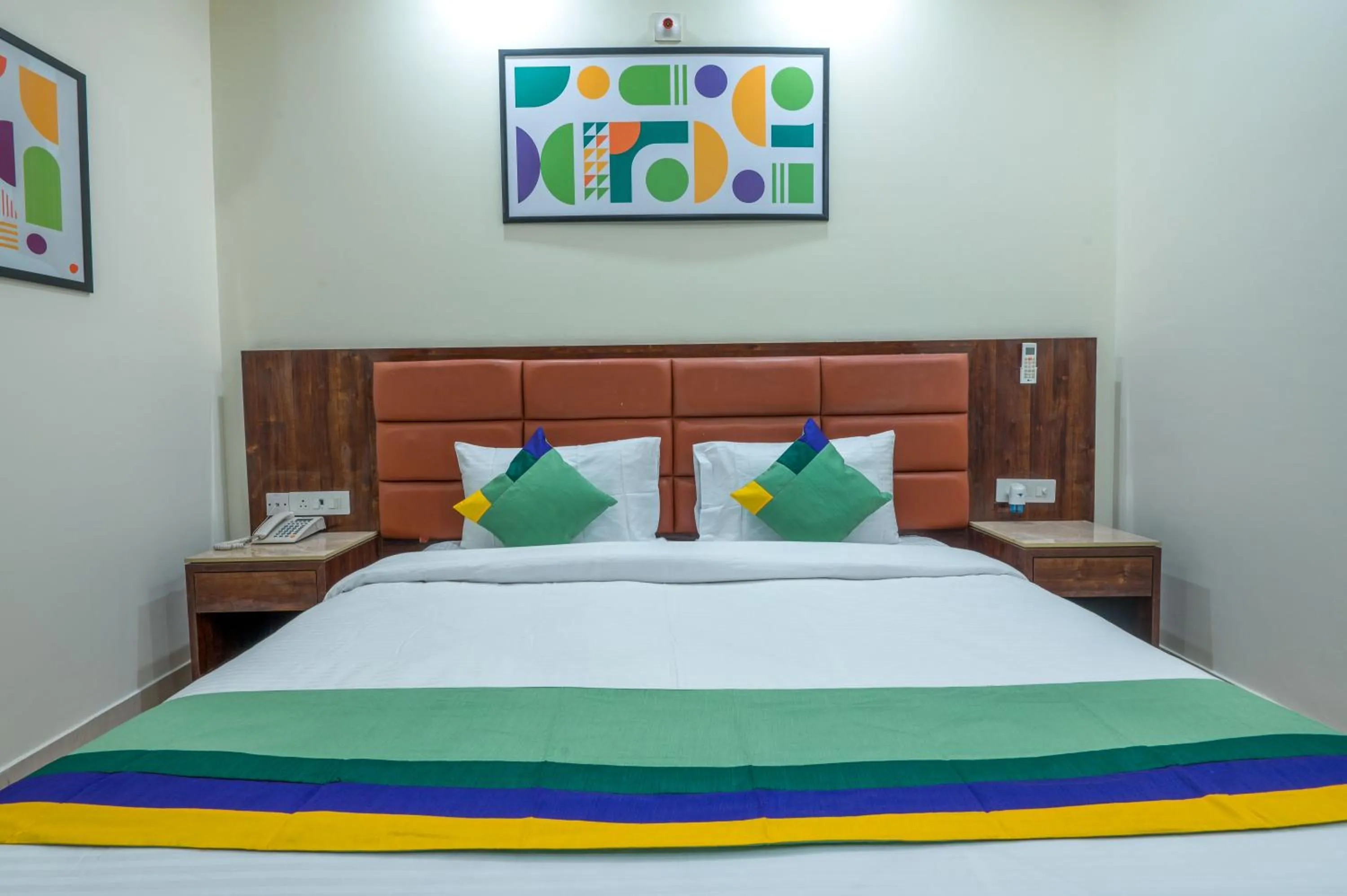 Bedroom, Bed in Treebo Sunny Feast