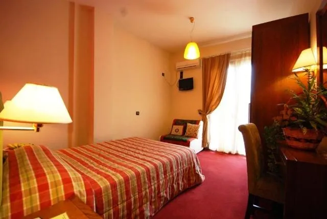 Bed in Hotel Elvetia