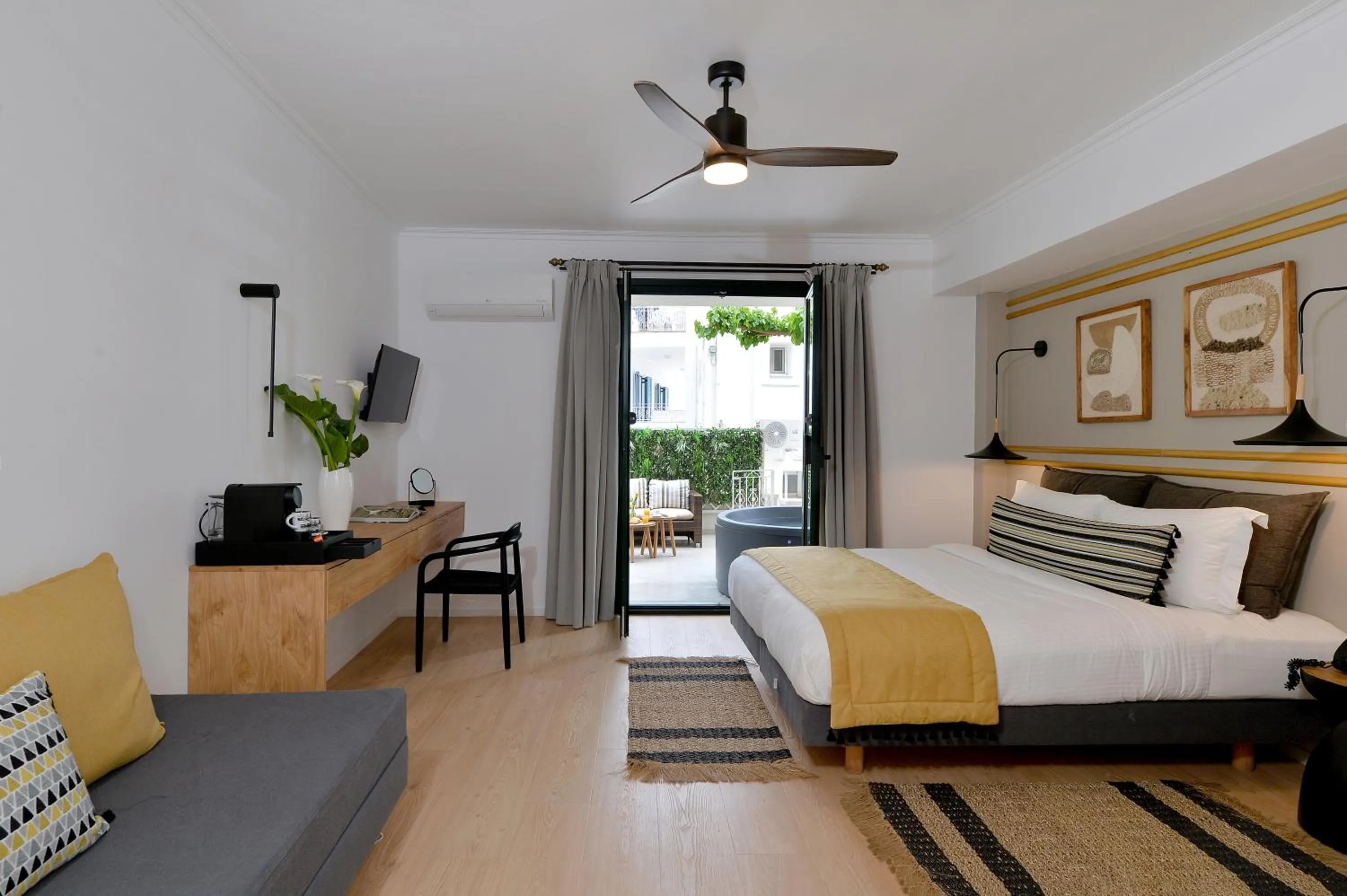 Photo of the whole room, Bed in Aktaion Beach Boutique Hotel & Spa