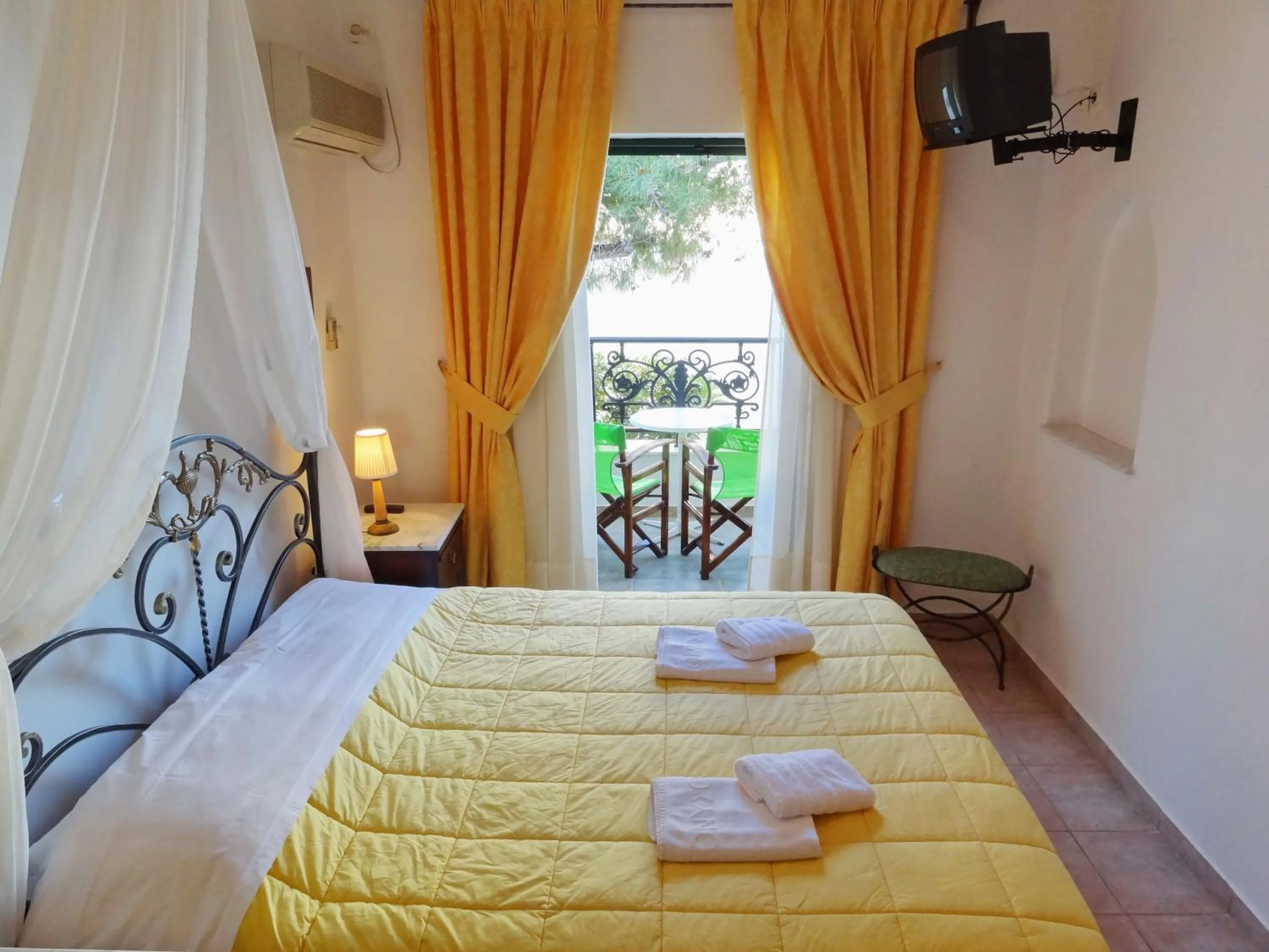 Balcony/Terrace, Bed in Dionysos Hotel