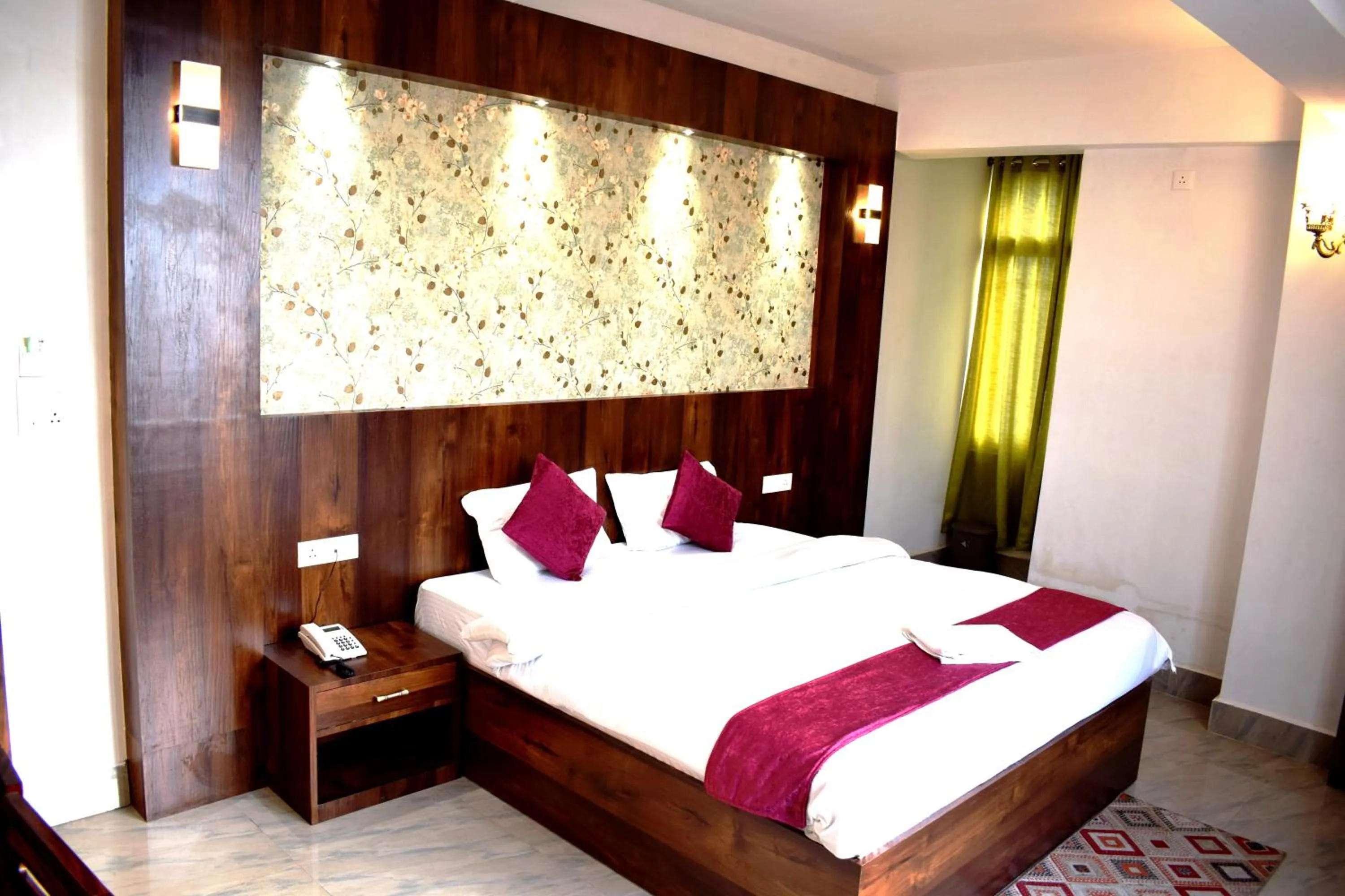 Bed in LILY GUEST HOUSE