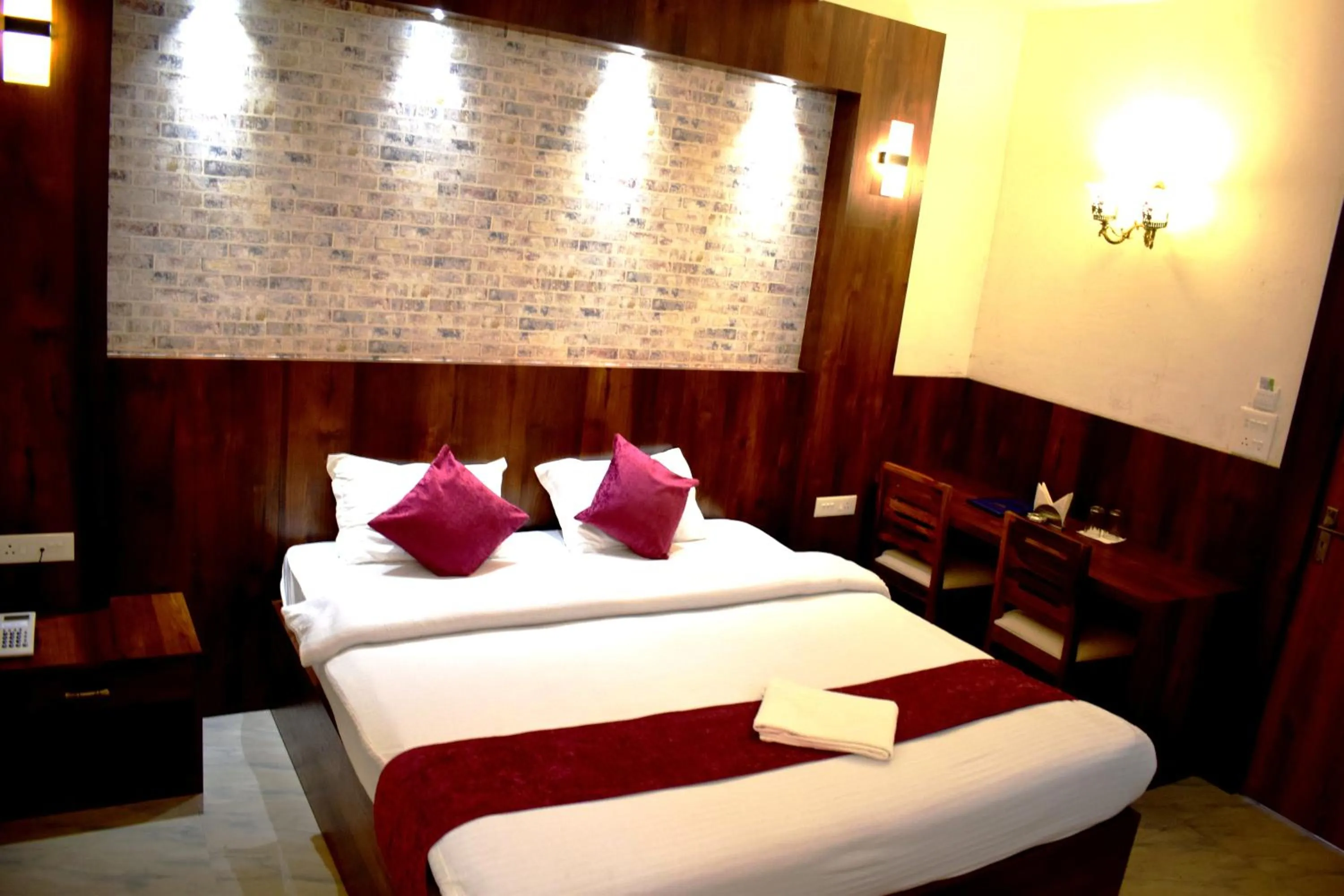 Bed in LILY GUEST HOUSE