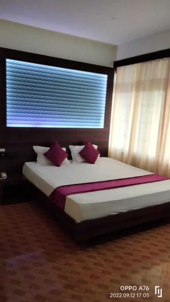 Bed in LILY GUEST HOUSE