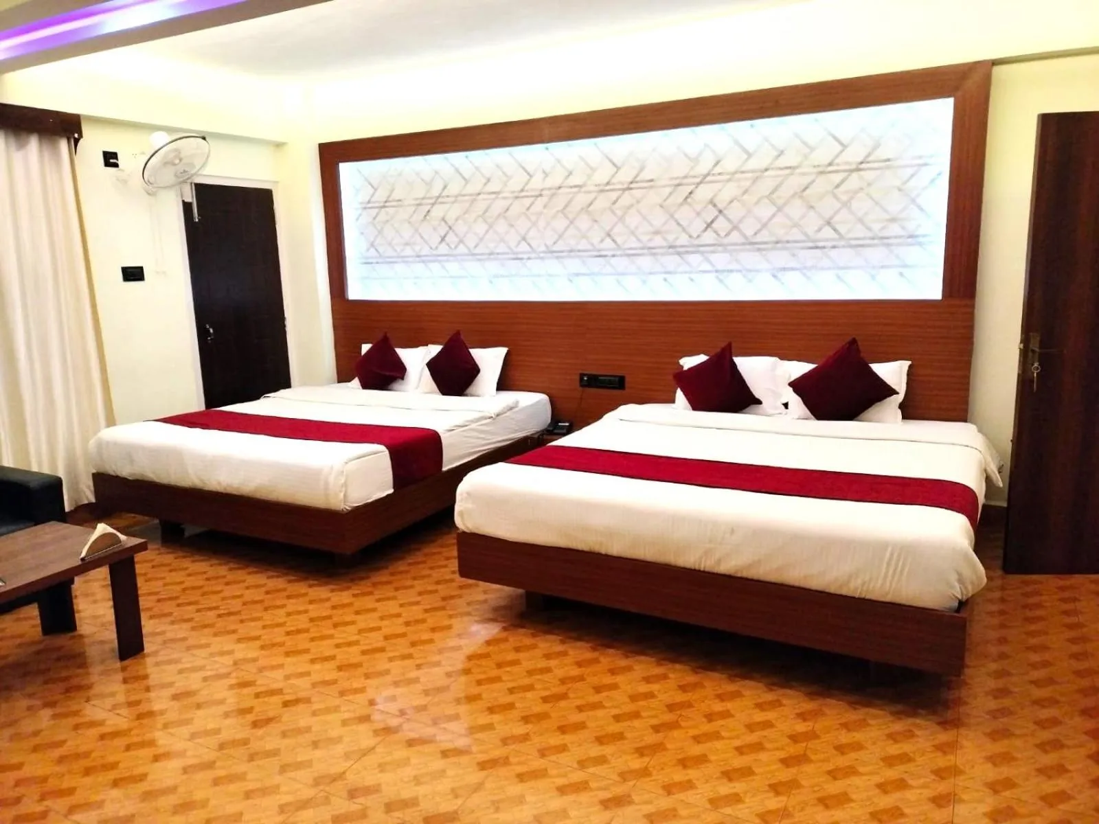 Bed in LILY GUEST HOUSE