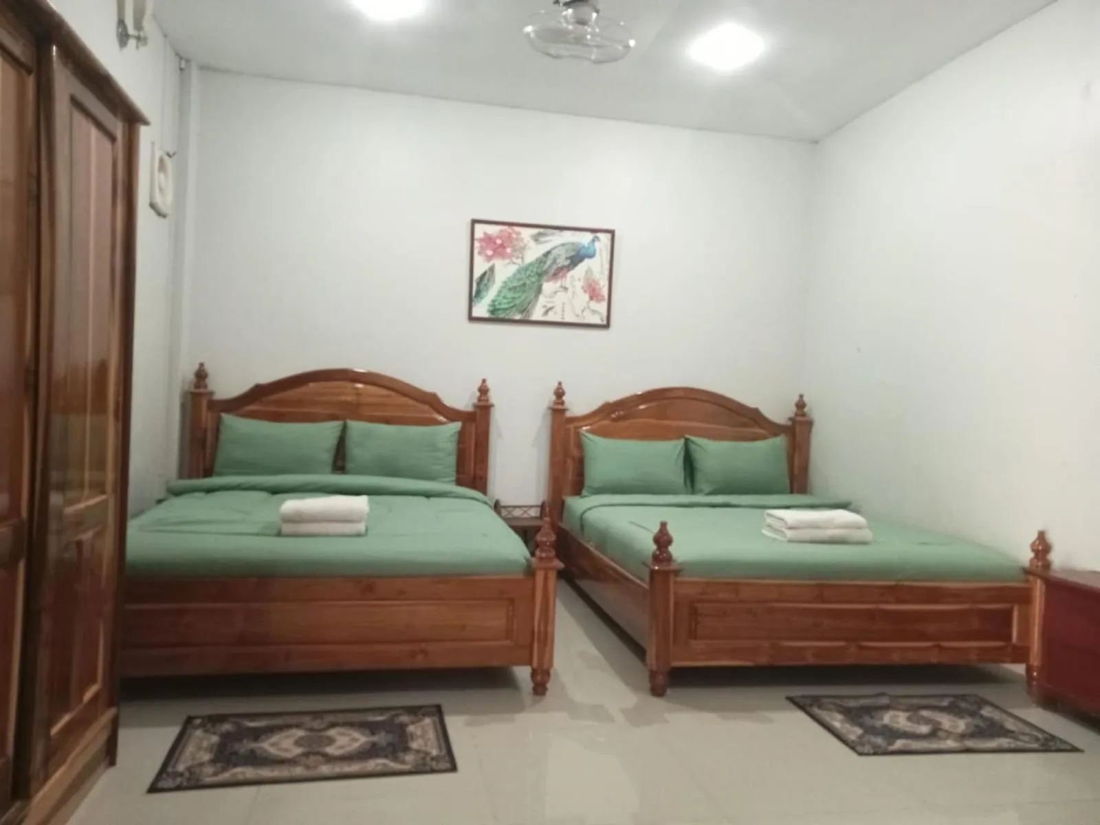 Bed in Erawan Guesthouse