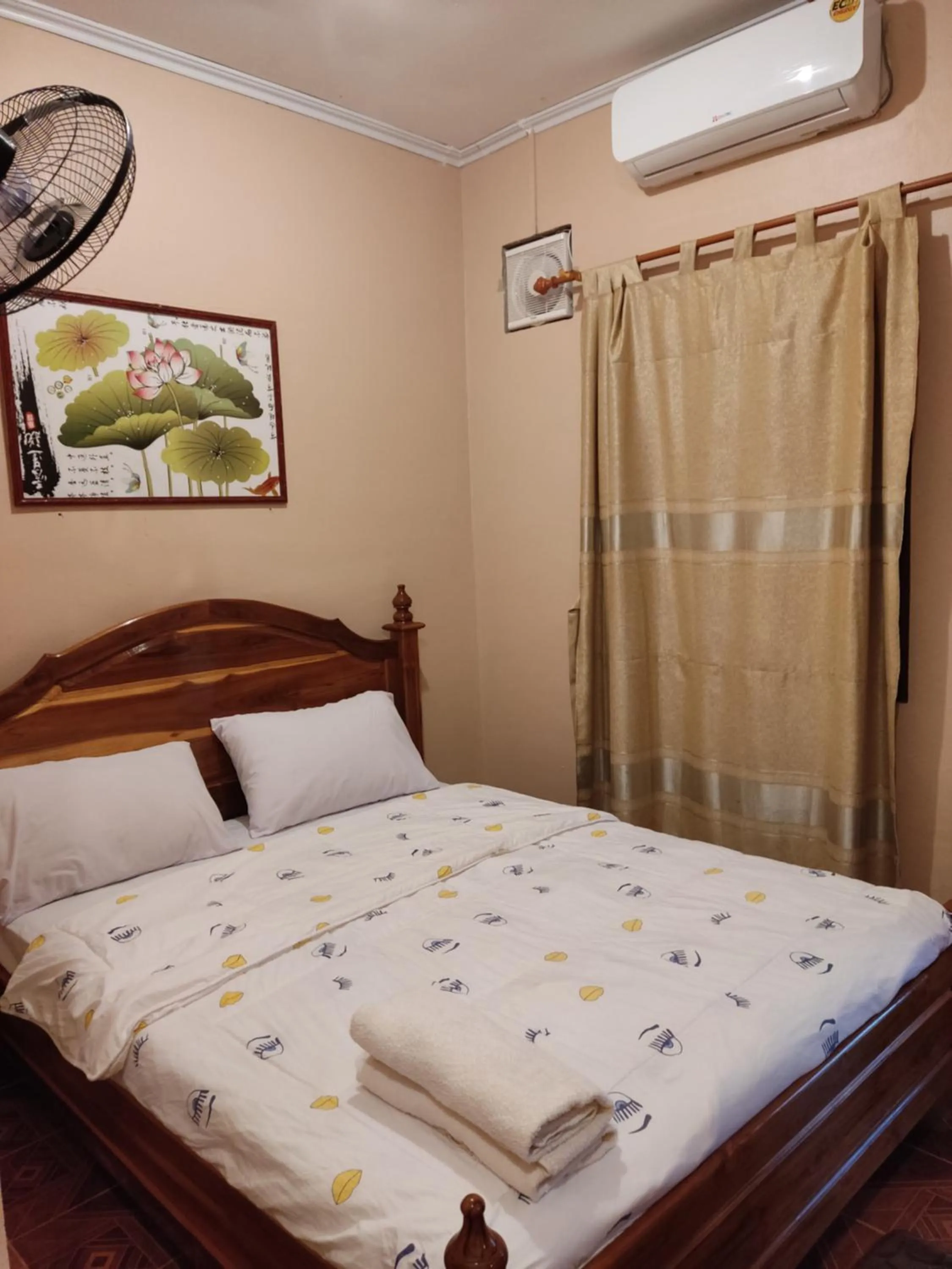 Bed in Erawan Guesthouse