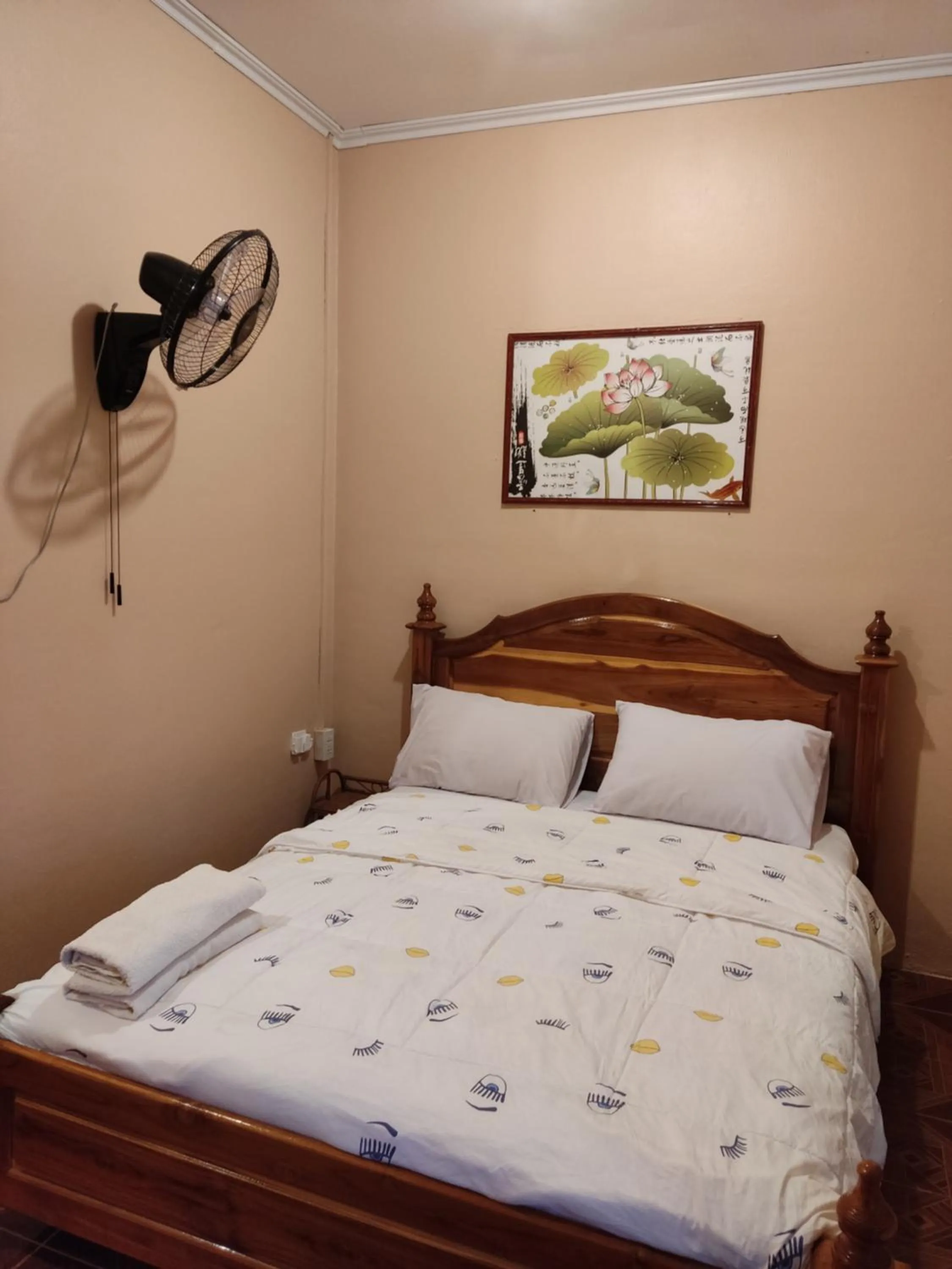 Bed in Erawan Guesthouse