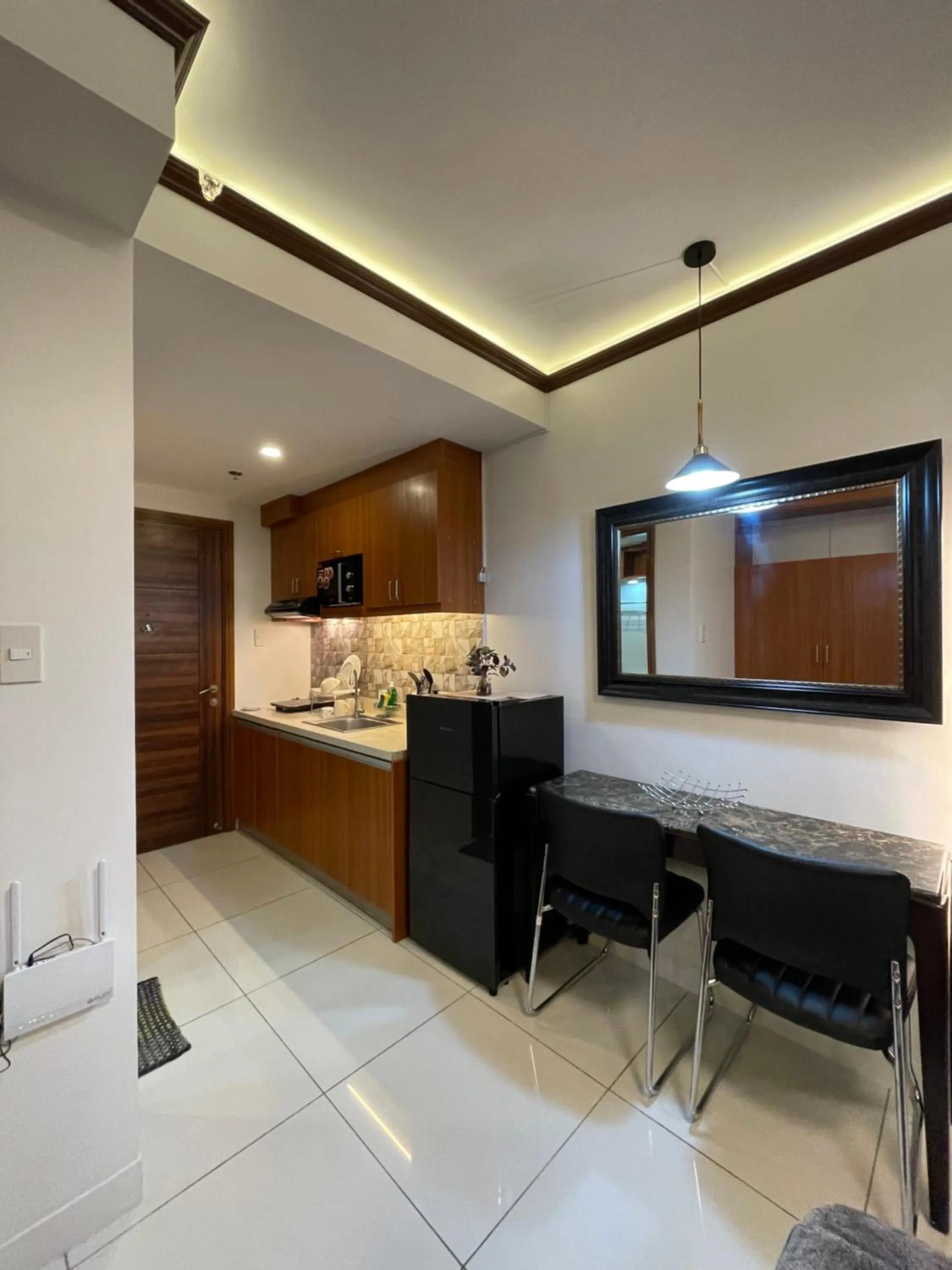 Kitchen or kitchenette in Cozy Studio at Horizon 101