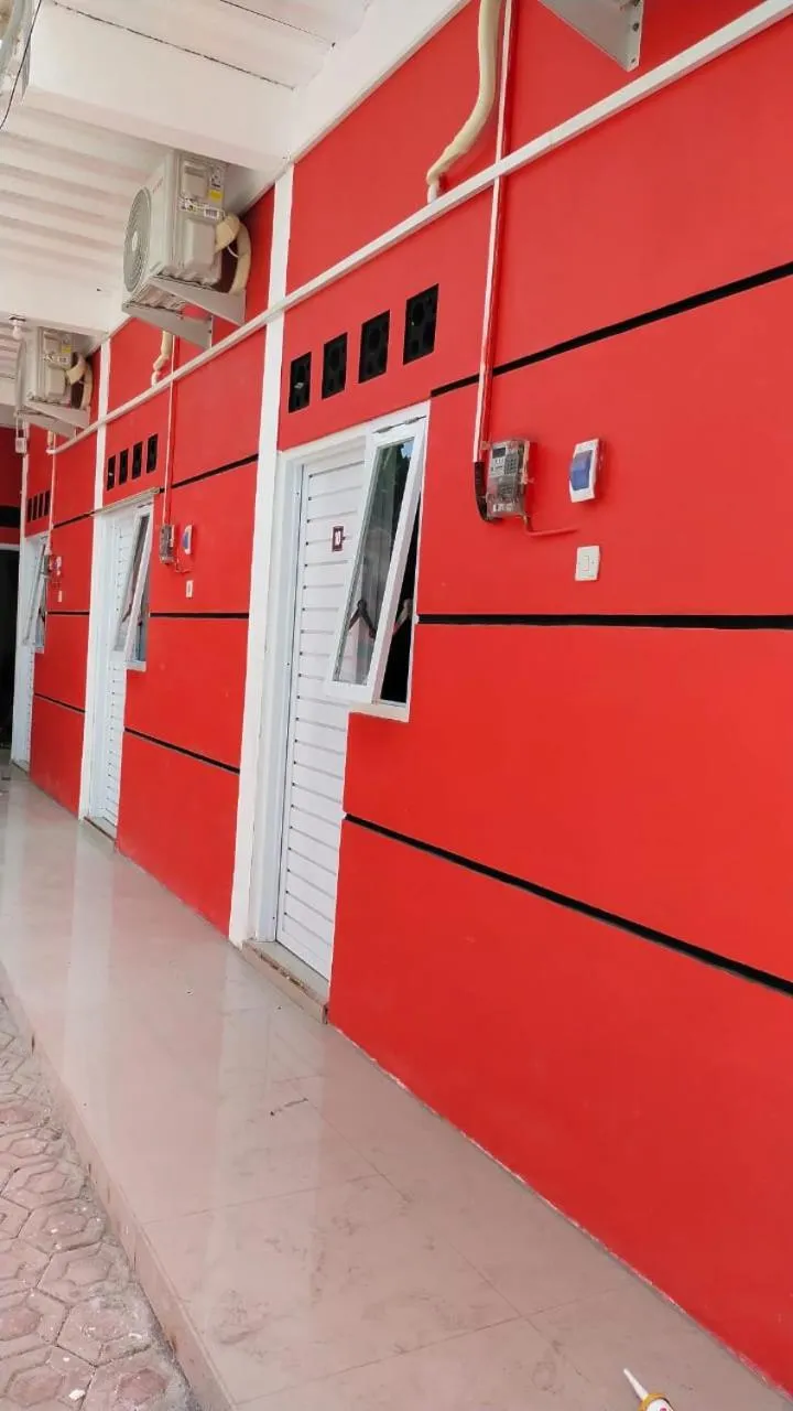 Property building in D'Ariska Rooms Homestay