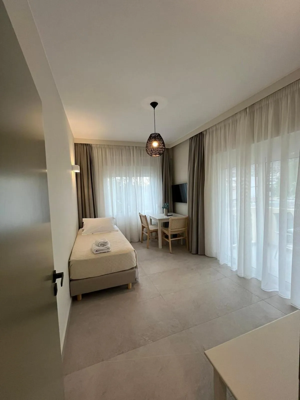 Photo of the whole room, Bed in Mediterranean Sea Top Floor