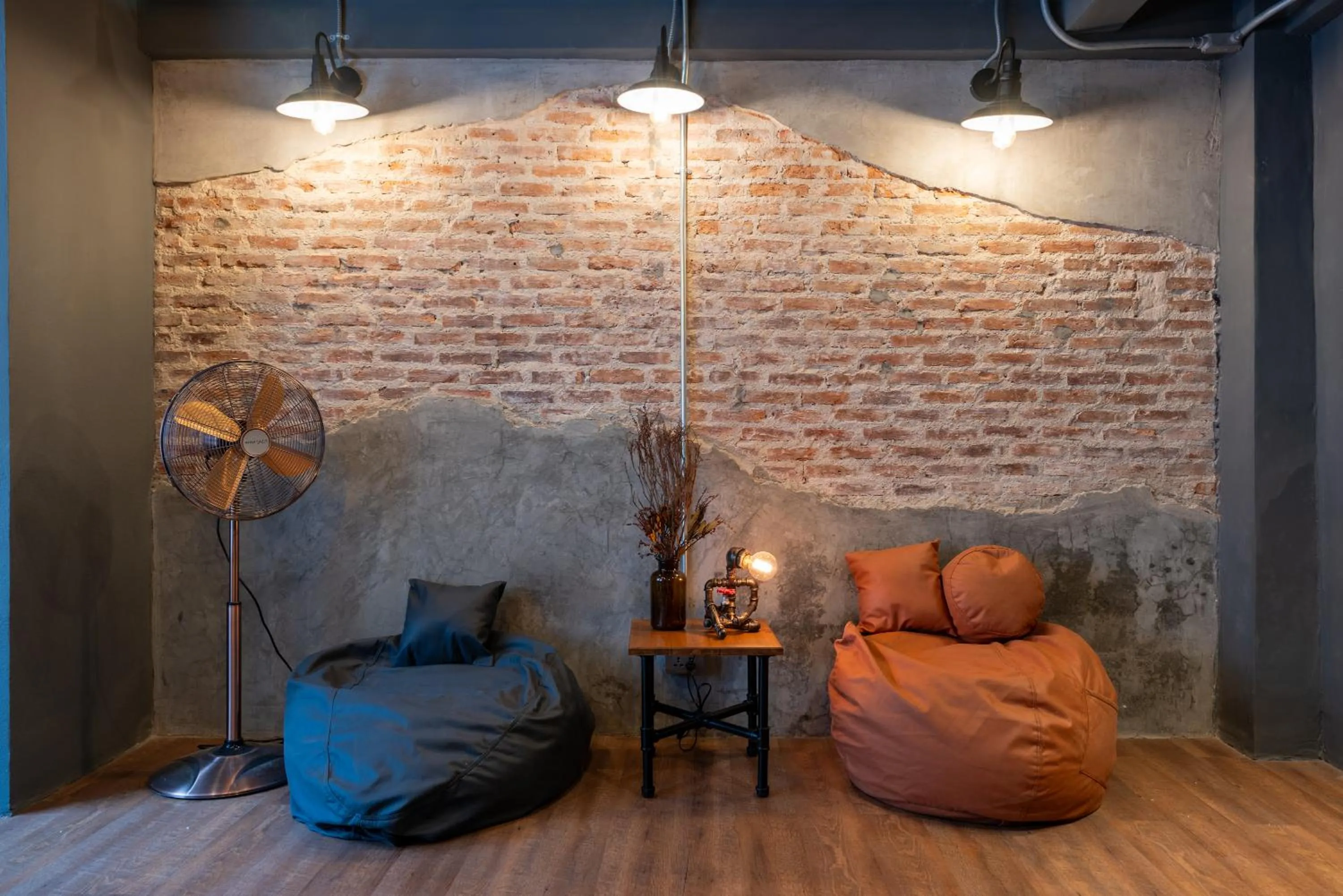 Communal lounge/ TV room in House of Machine Boutique Hotel