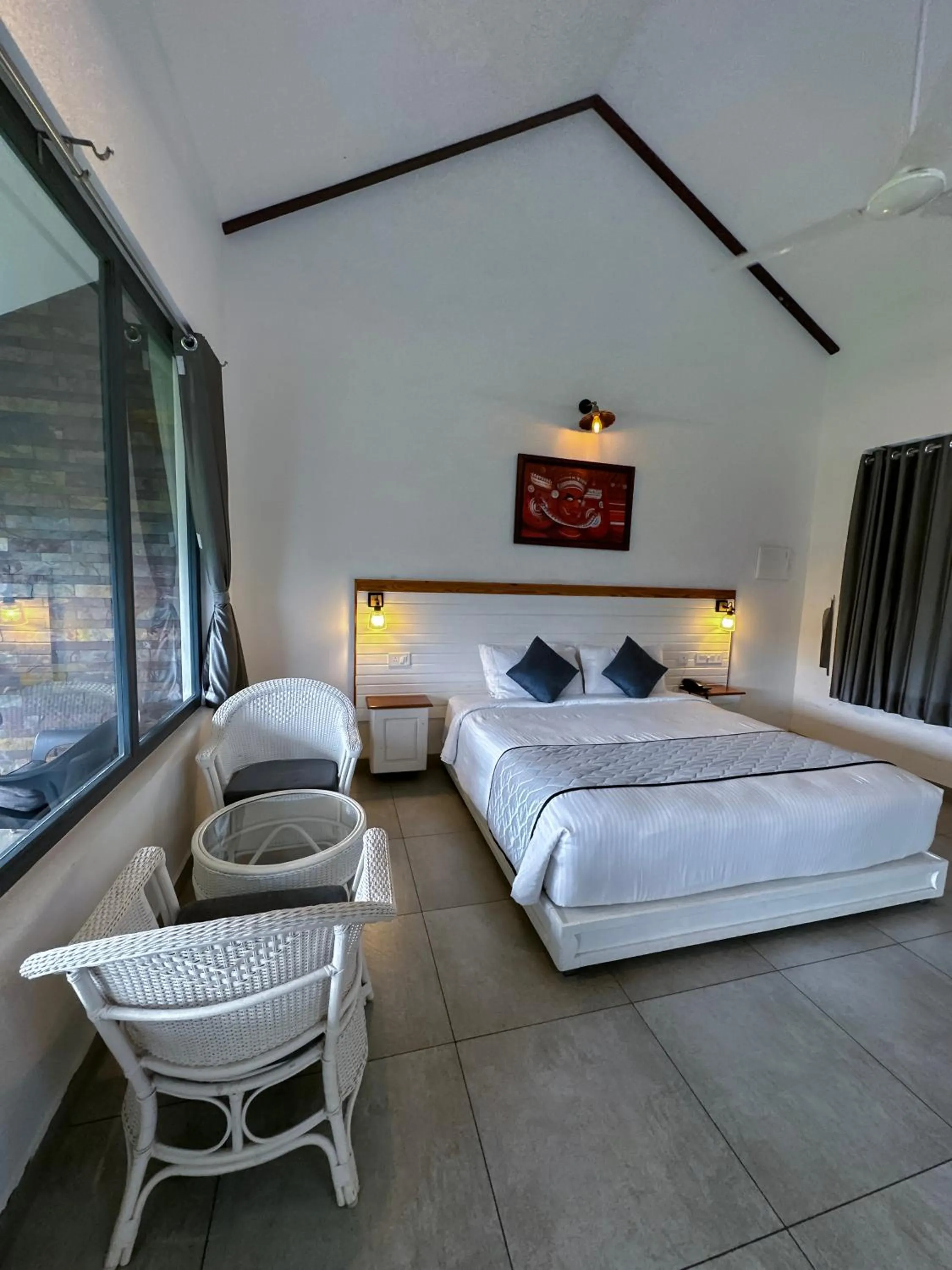 Bed in PEKOE Plantation Cottages by LexStays