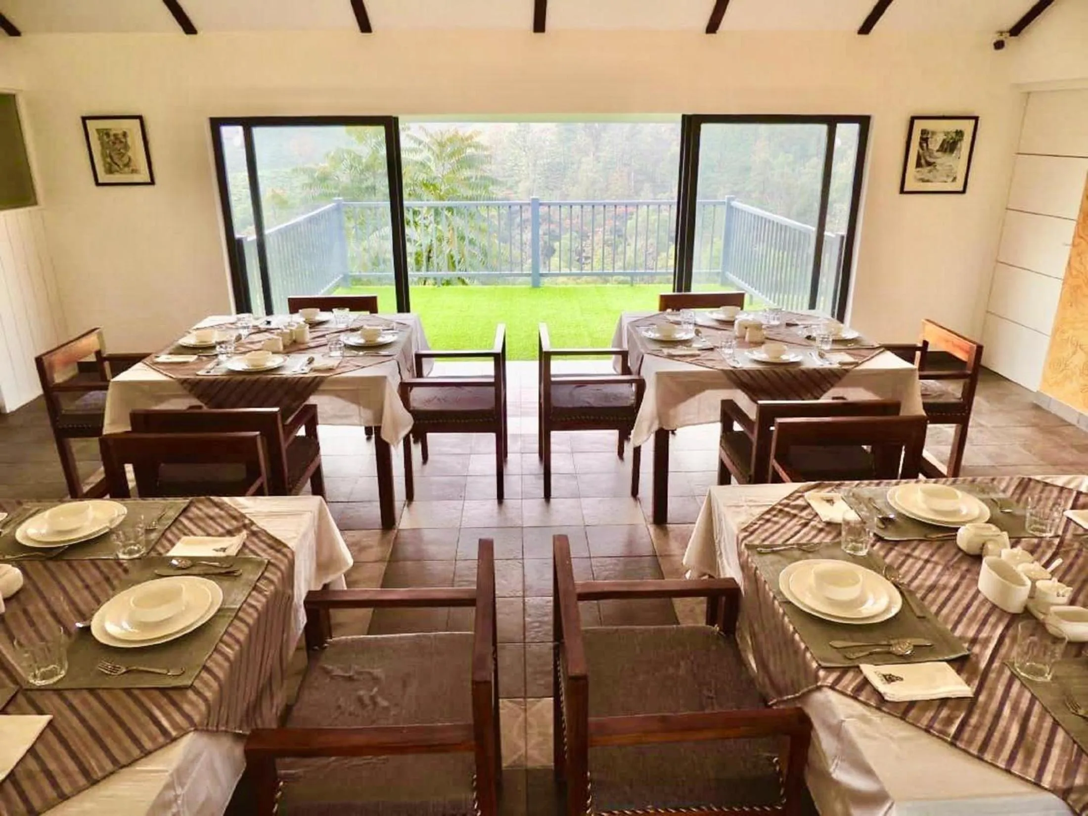 Living room in PEKOE Plantation Cottages by LexStays