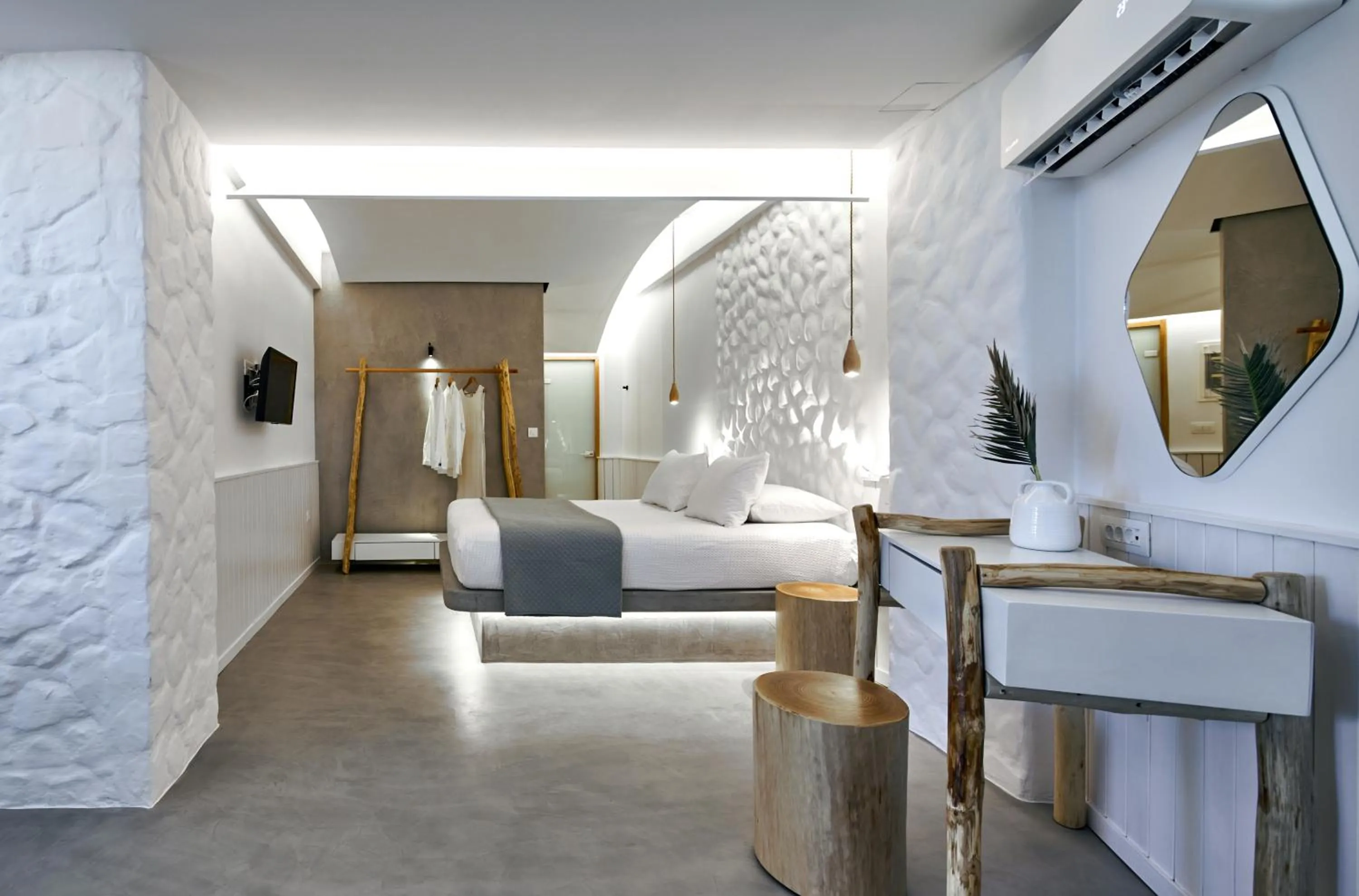 Bed in Oscar Beachfront Suites - Adults Only