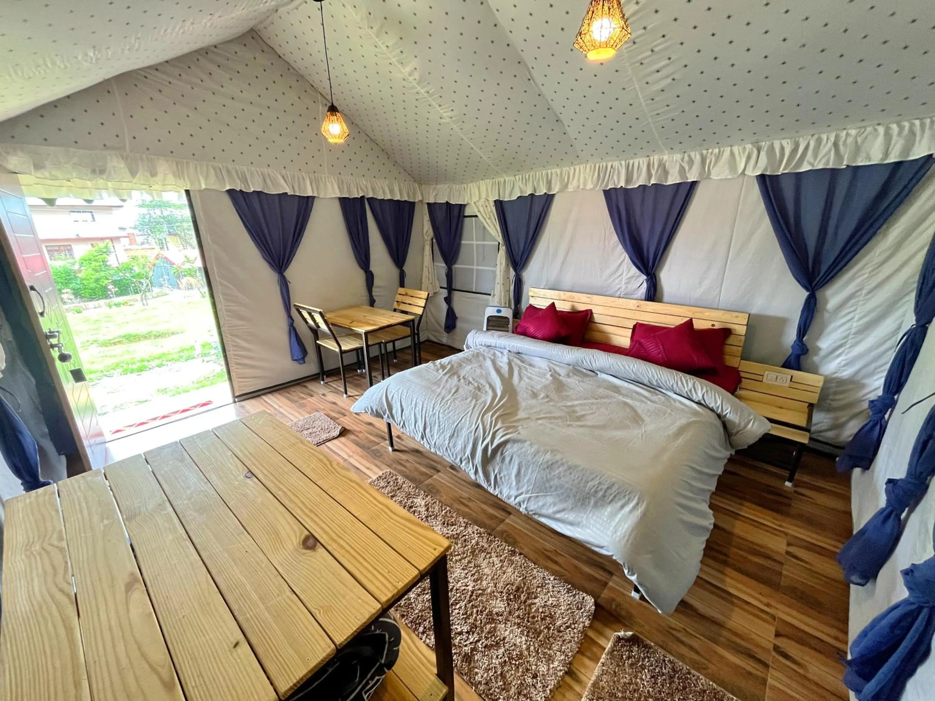 Living room, Bed in Imilia Camps