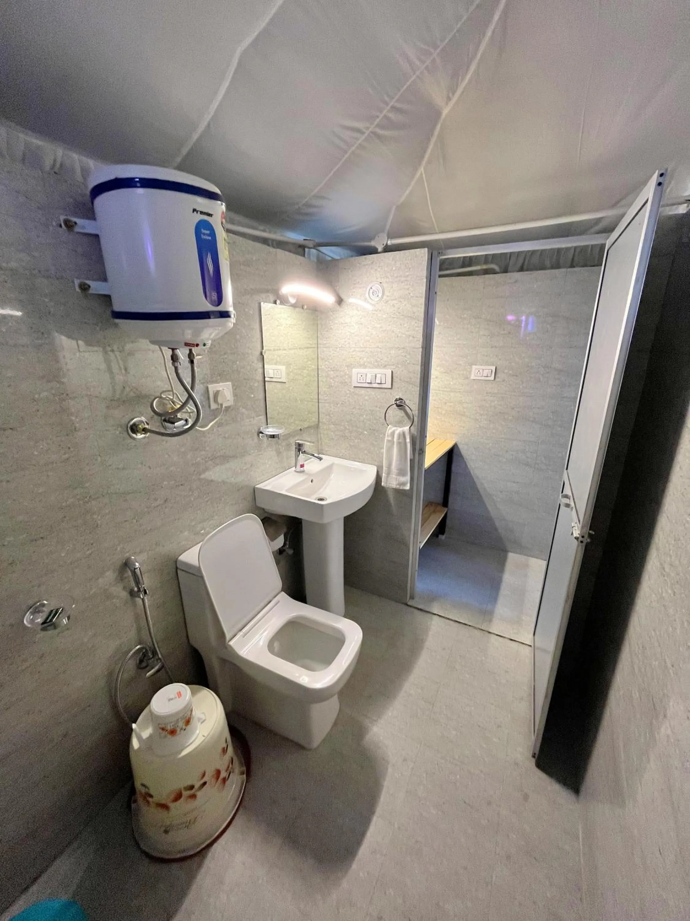 Shower in Imilia Camps