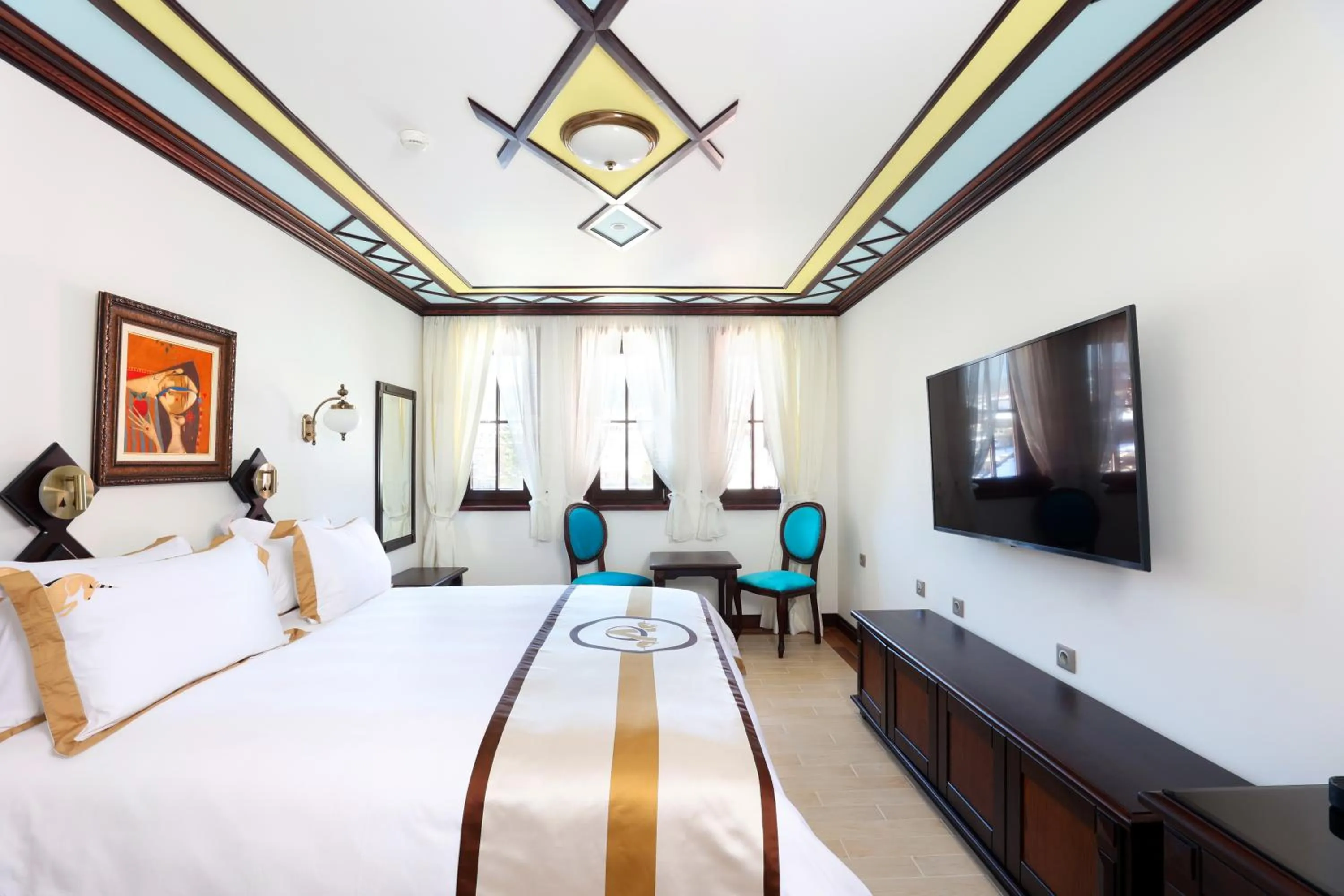 Bed in Armaco Residence