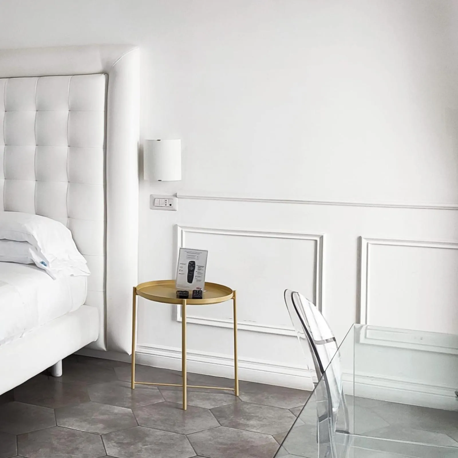 Bed in RAVIDA SUITES