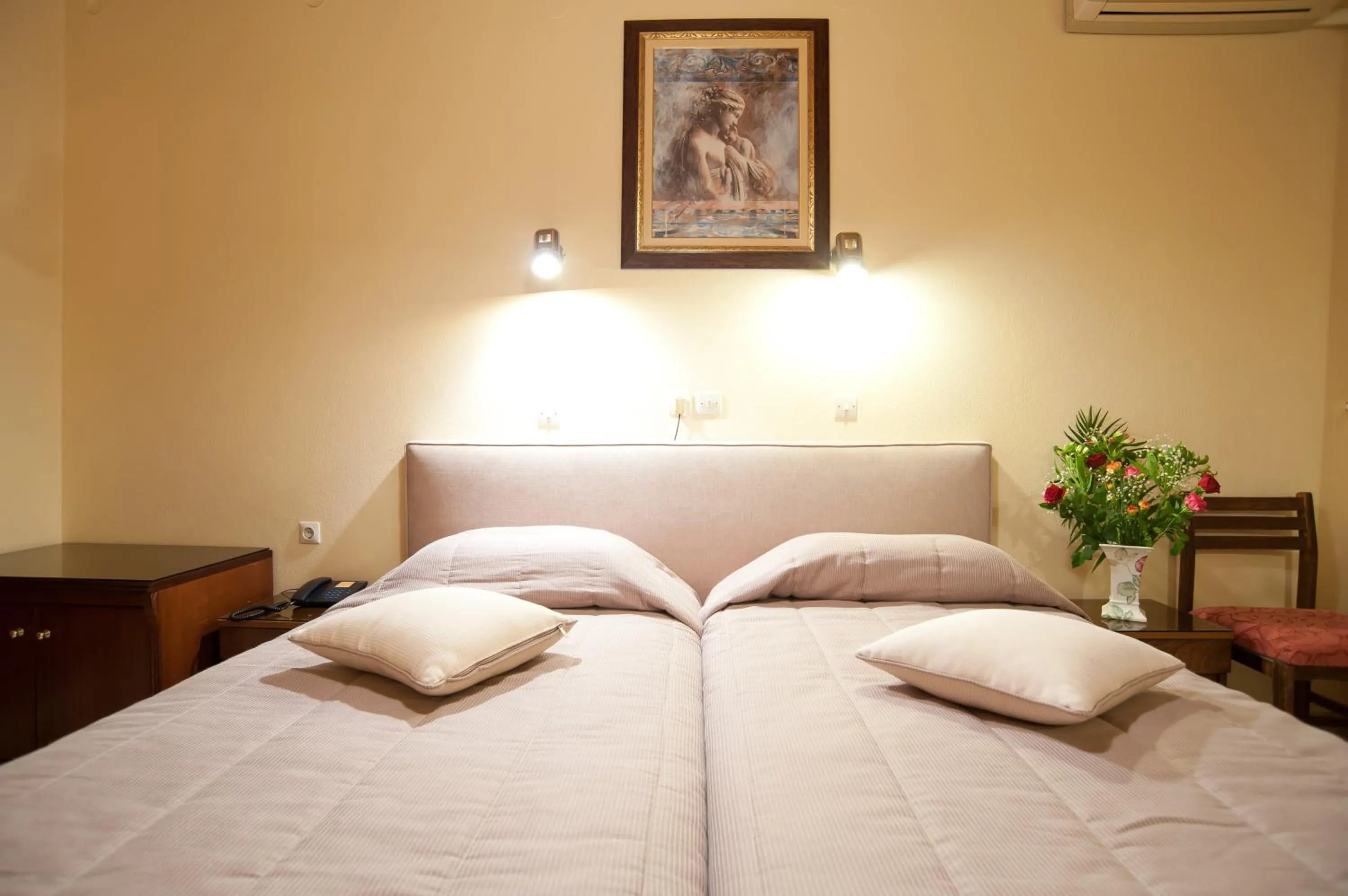 Bed in Hermes Delphi Hotel