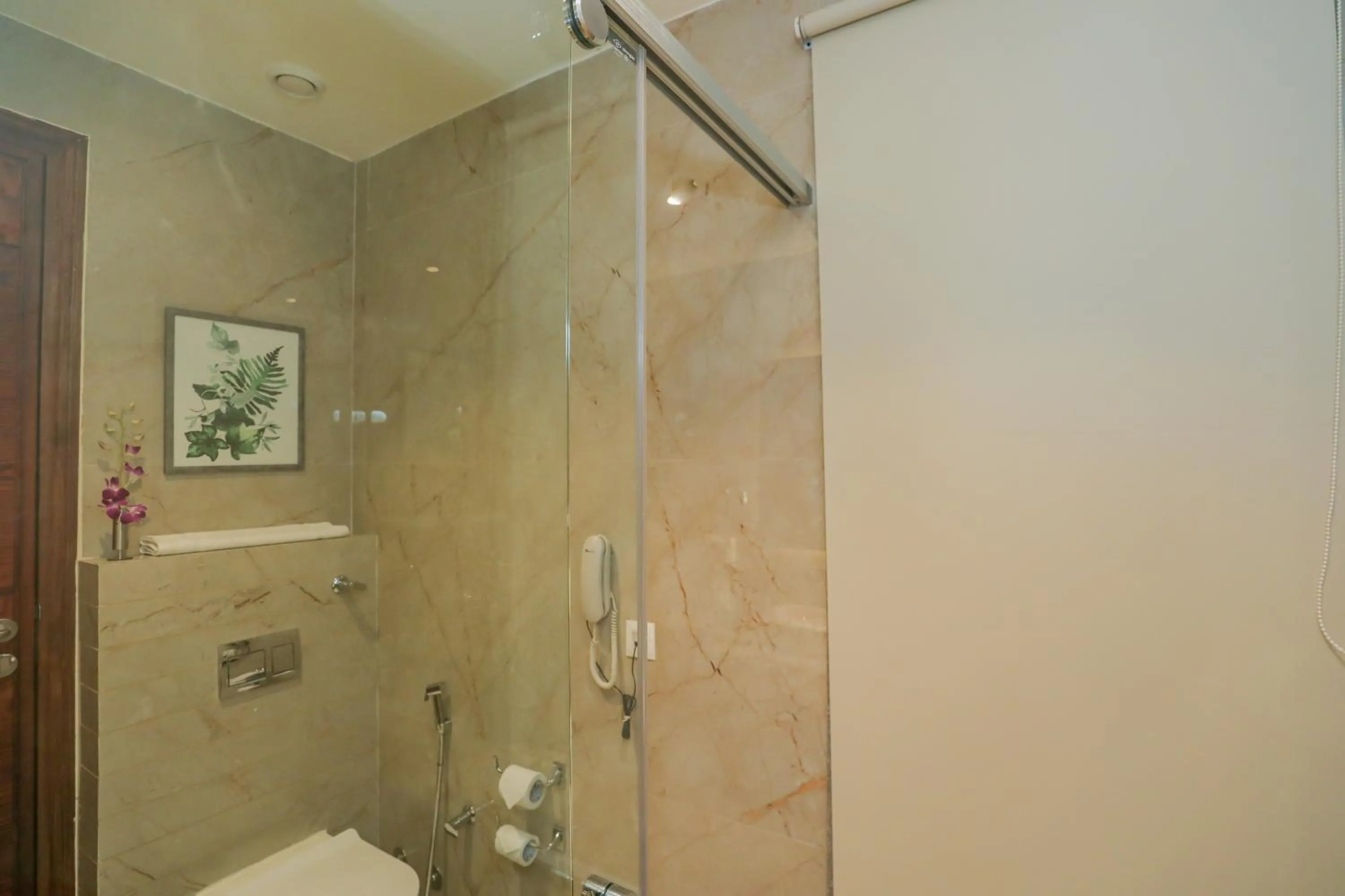 Bathroom in Regenta Place Phagwara by Royal Orchid Hotels Limited