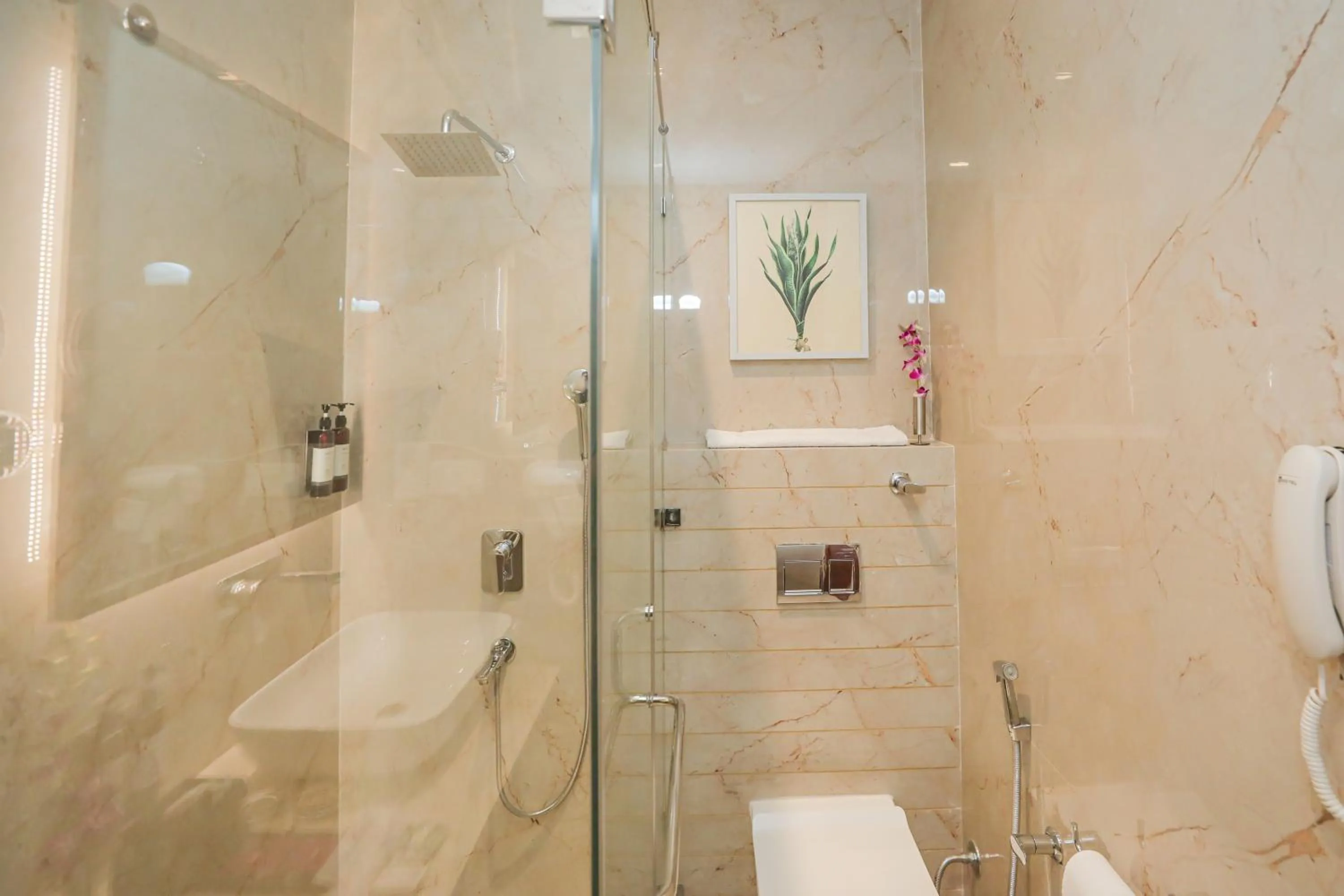 Bathroom in Regenta Place Phagwara by Royal Orchid Hotels Limited