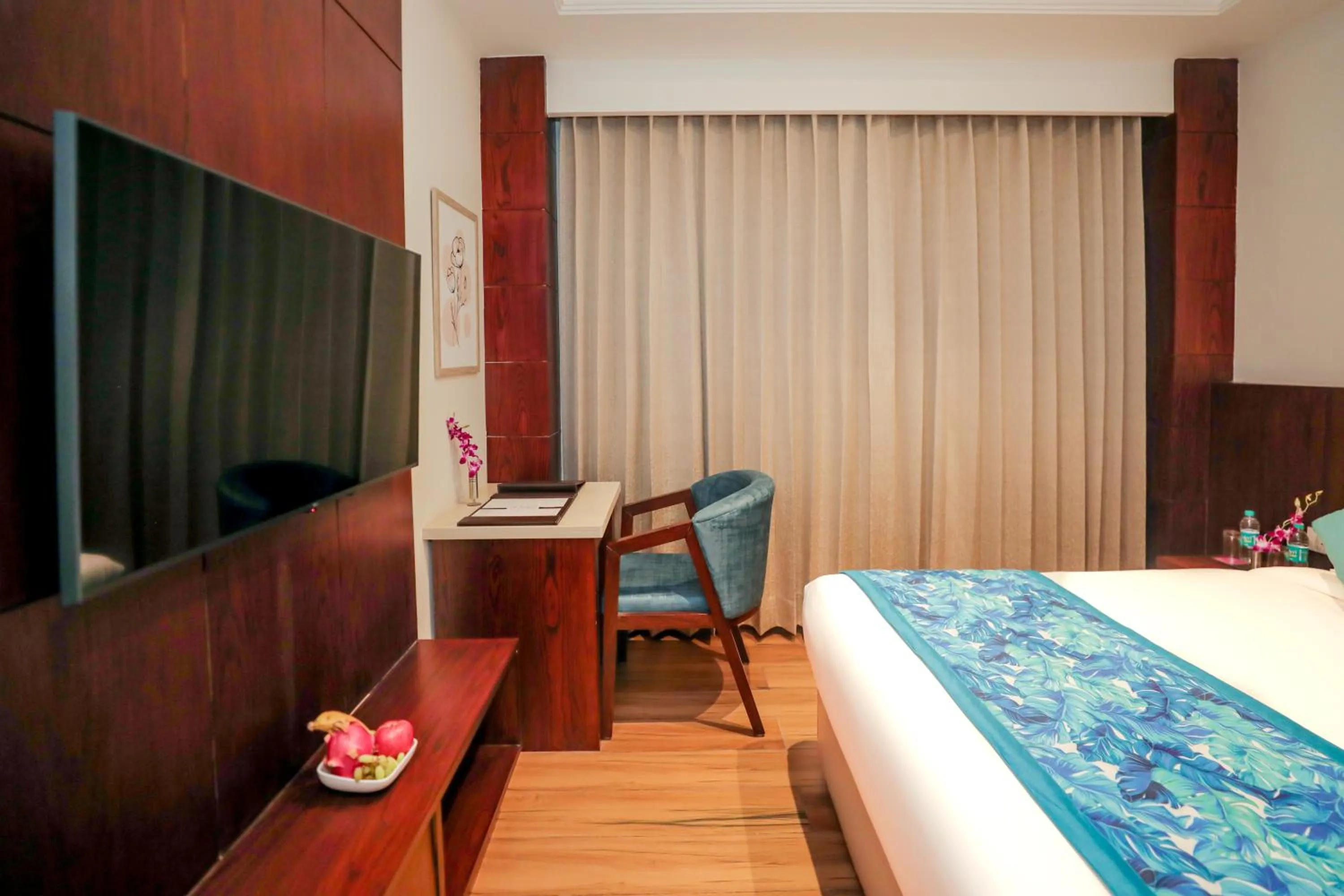 TV and multimedia, Bed in Regenta Place Phagwara by Royal Orchid Hotels Limited
