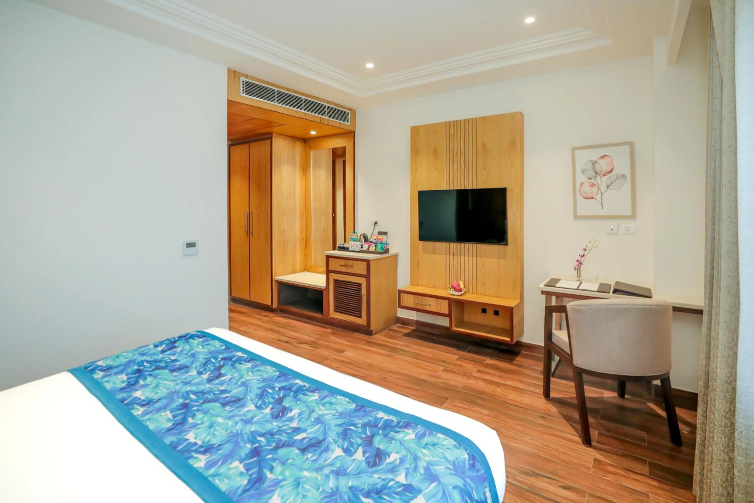 TV and multimedia, Bed in Regenta Place Phagwara by Royal Orchid Hotels Limited