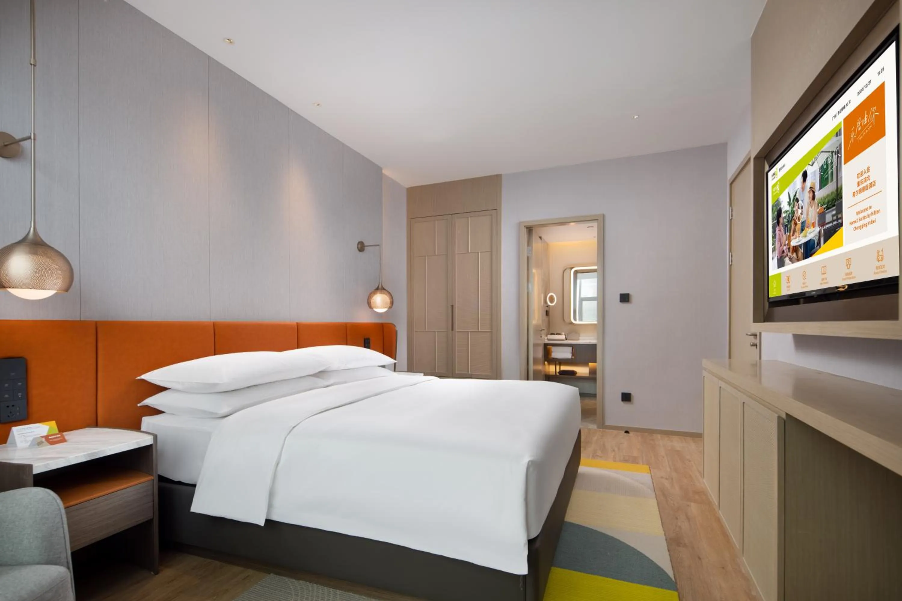 Communal lounge/ TV room, Bed in Home2 Suites by Hilton Chongqing Yubei