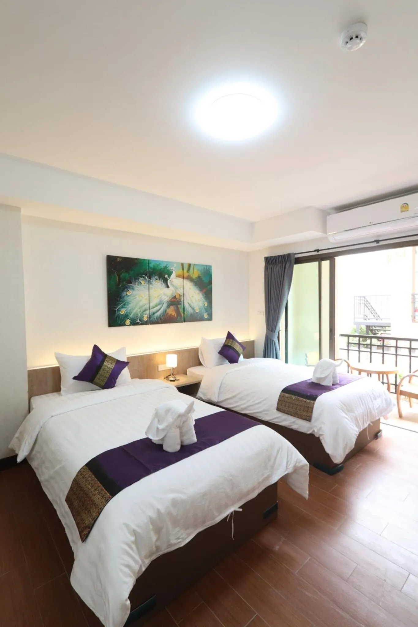 Photo of the whole room, Bed in Peacock De Pai Hotel