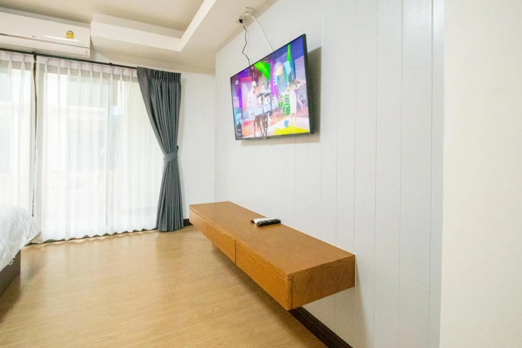 TV and multimedia, Bed in Peacock De Pai Hotel