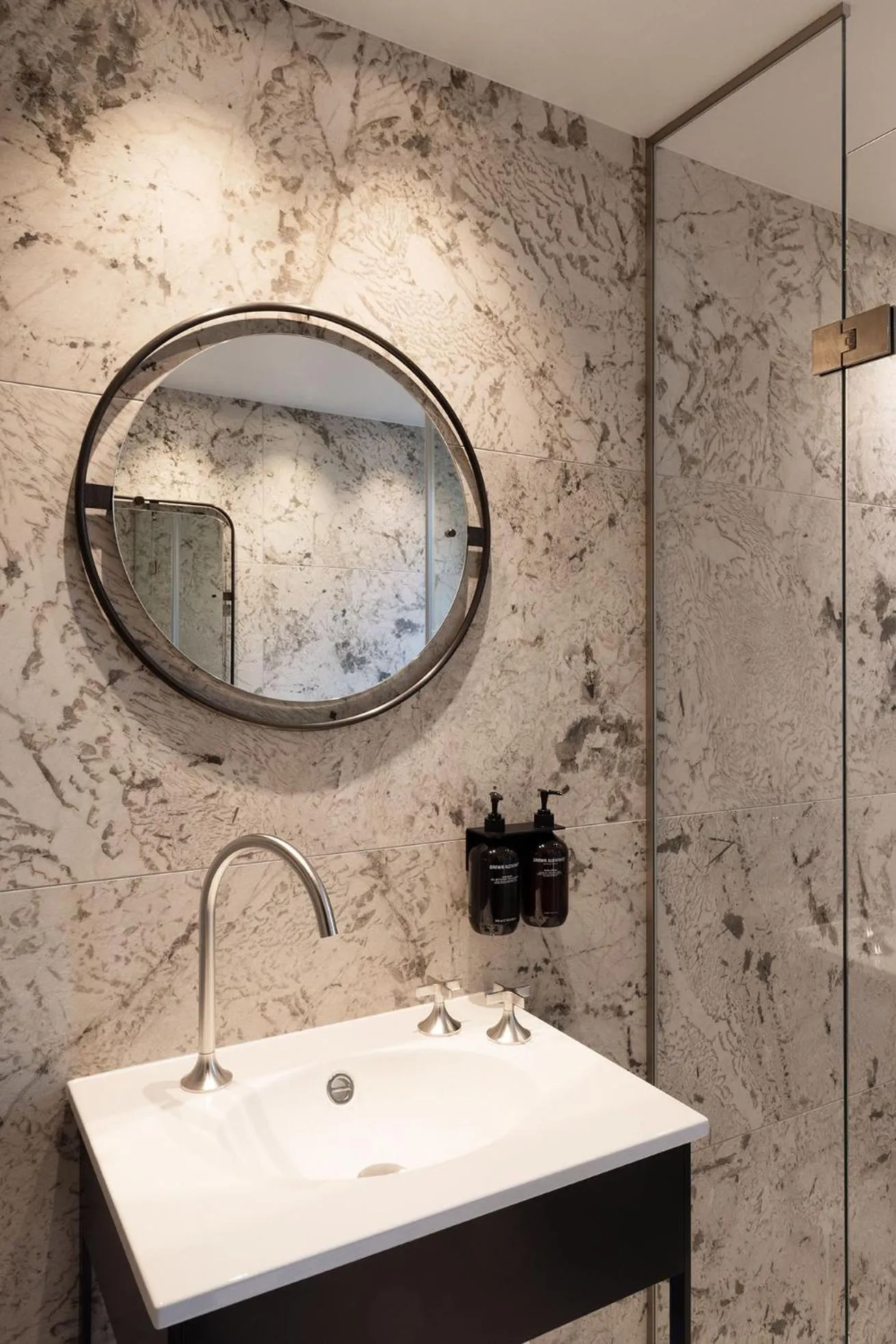 Bathroom in Hypernym Hotel & Suites