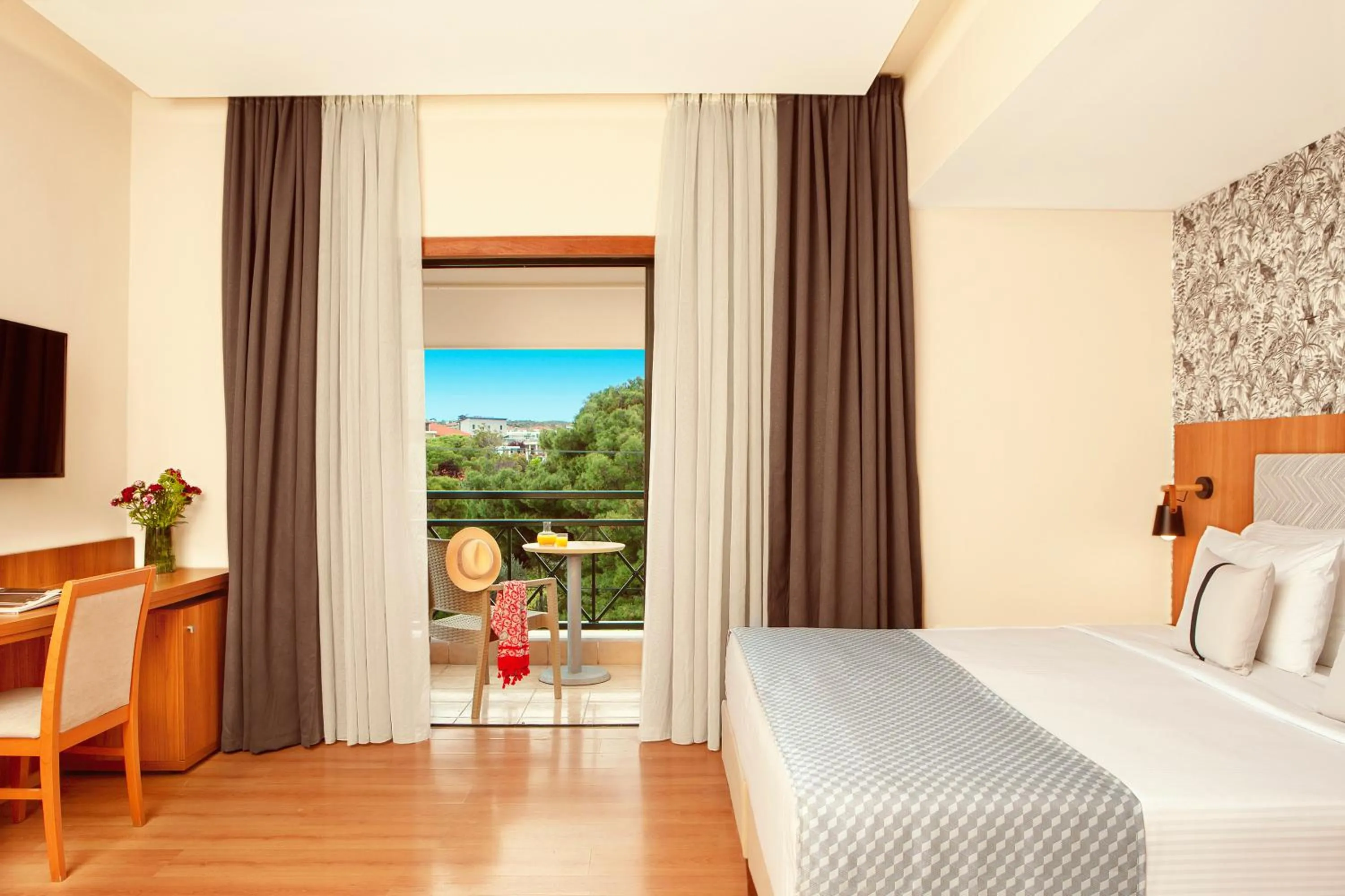 Bed in Zeus Essence Ramada by Wyndham Athens