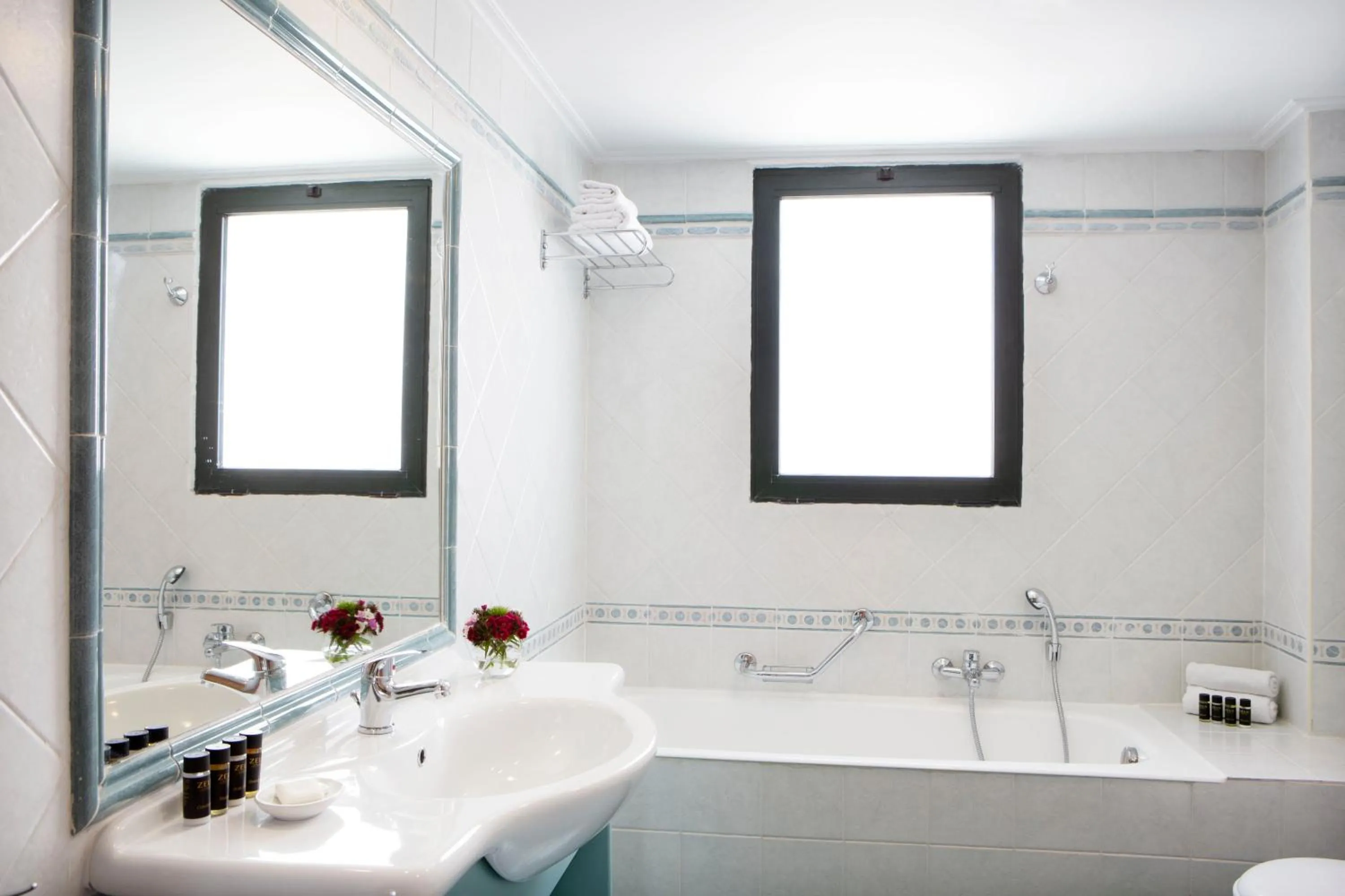 Bathroom in Zeus Essence Ramada by Wyndham Athens