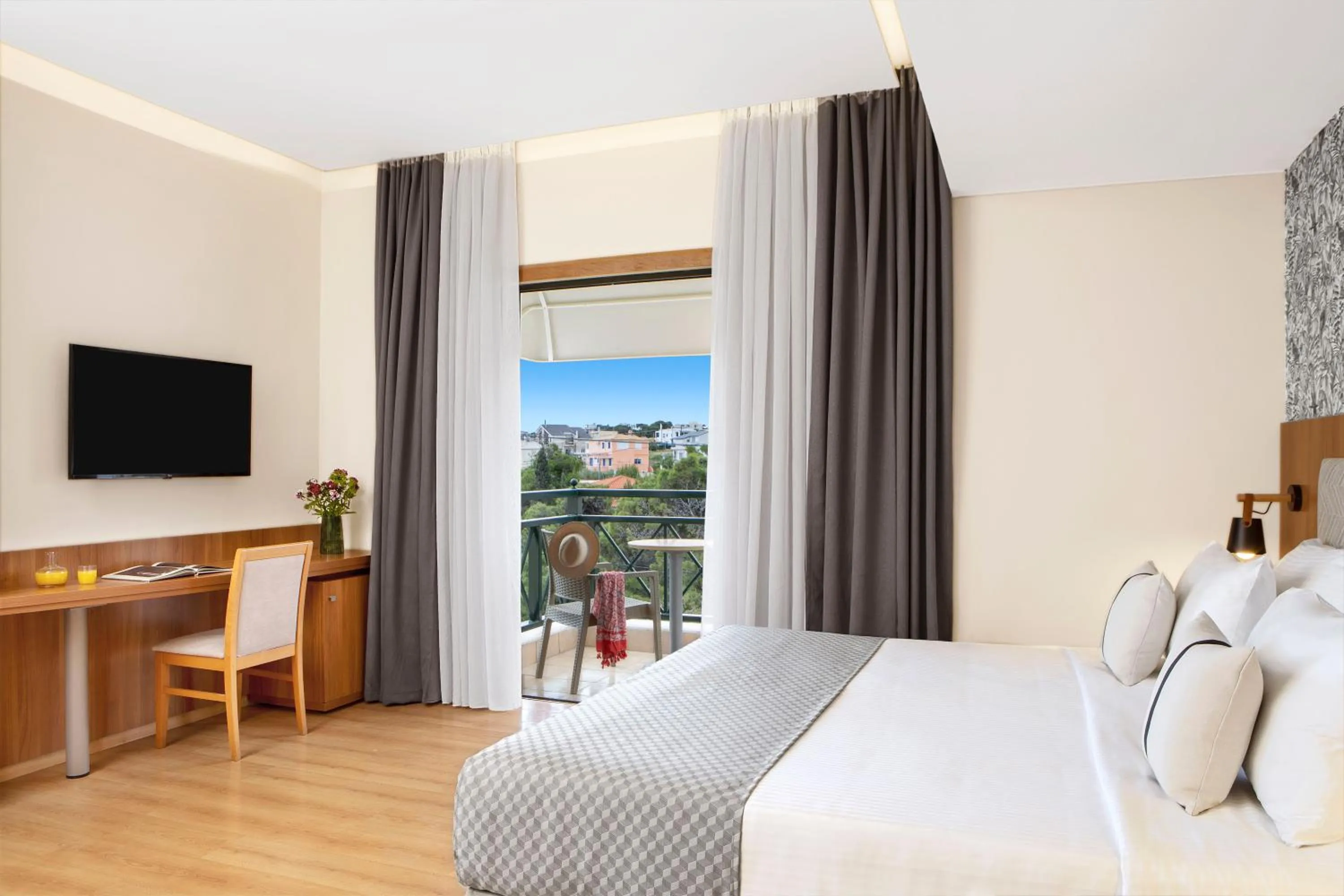 Bed in Zeus Essence Ramada by Wyndham Athens